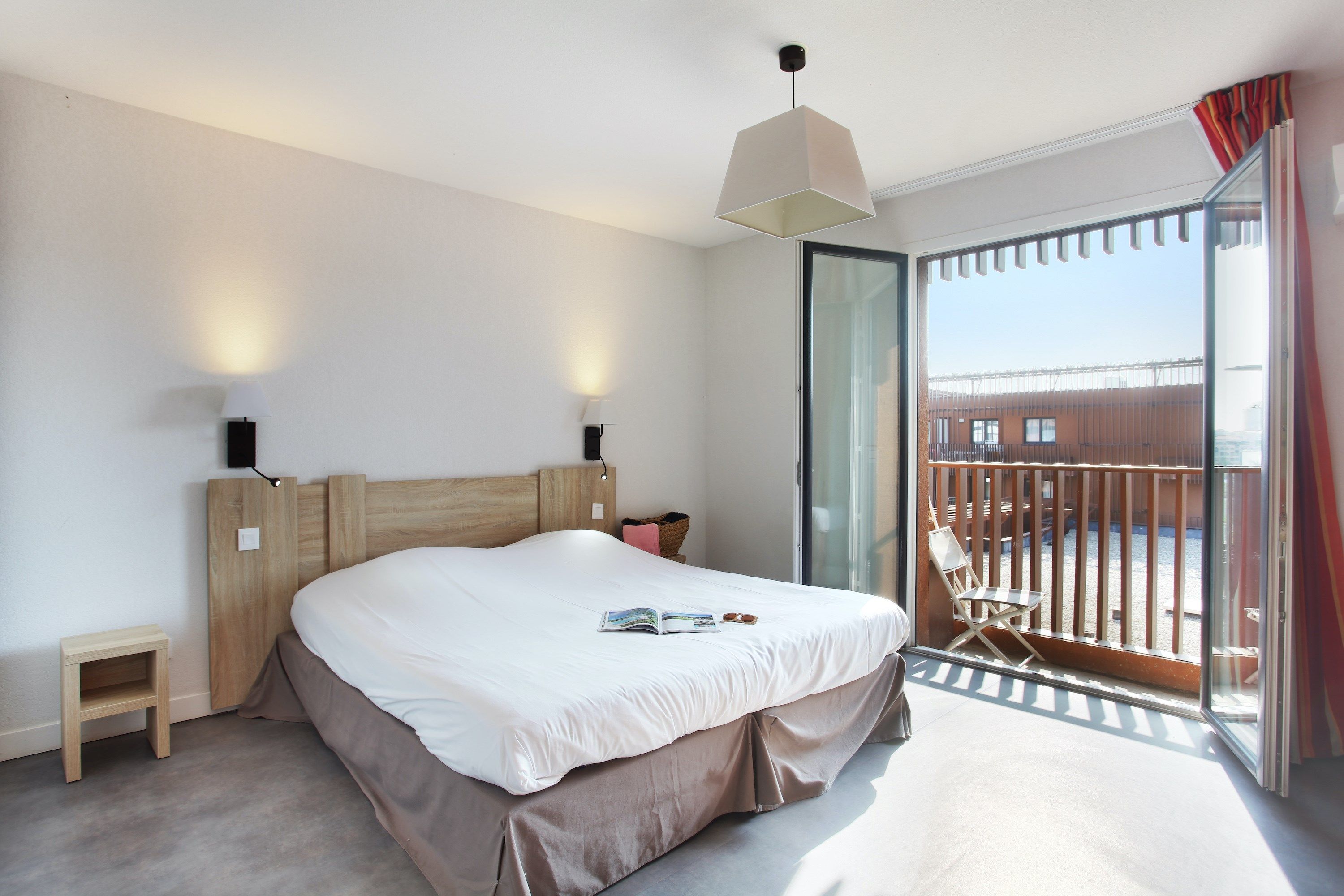 image Drift to sleep in a comfortable bed after a wonderful day outside.