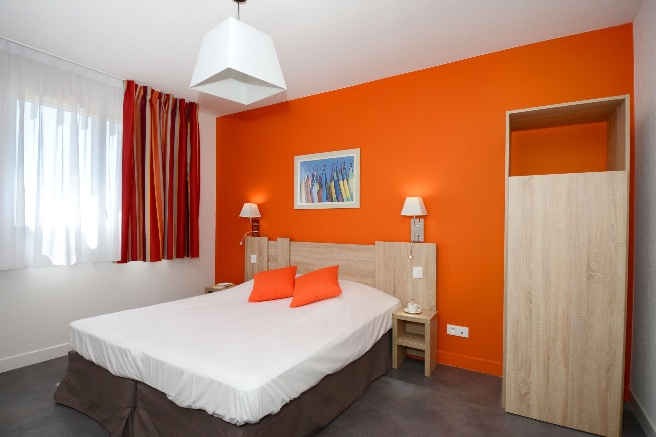 image Drift to sleep in a comfortable bed after a wonderful day outside.