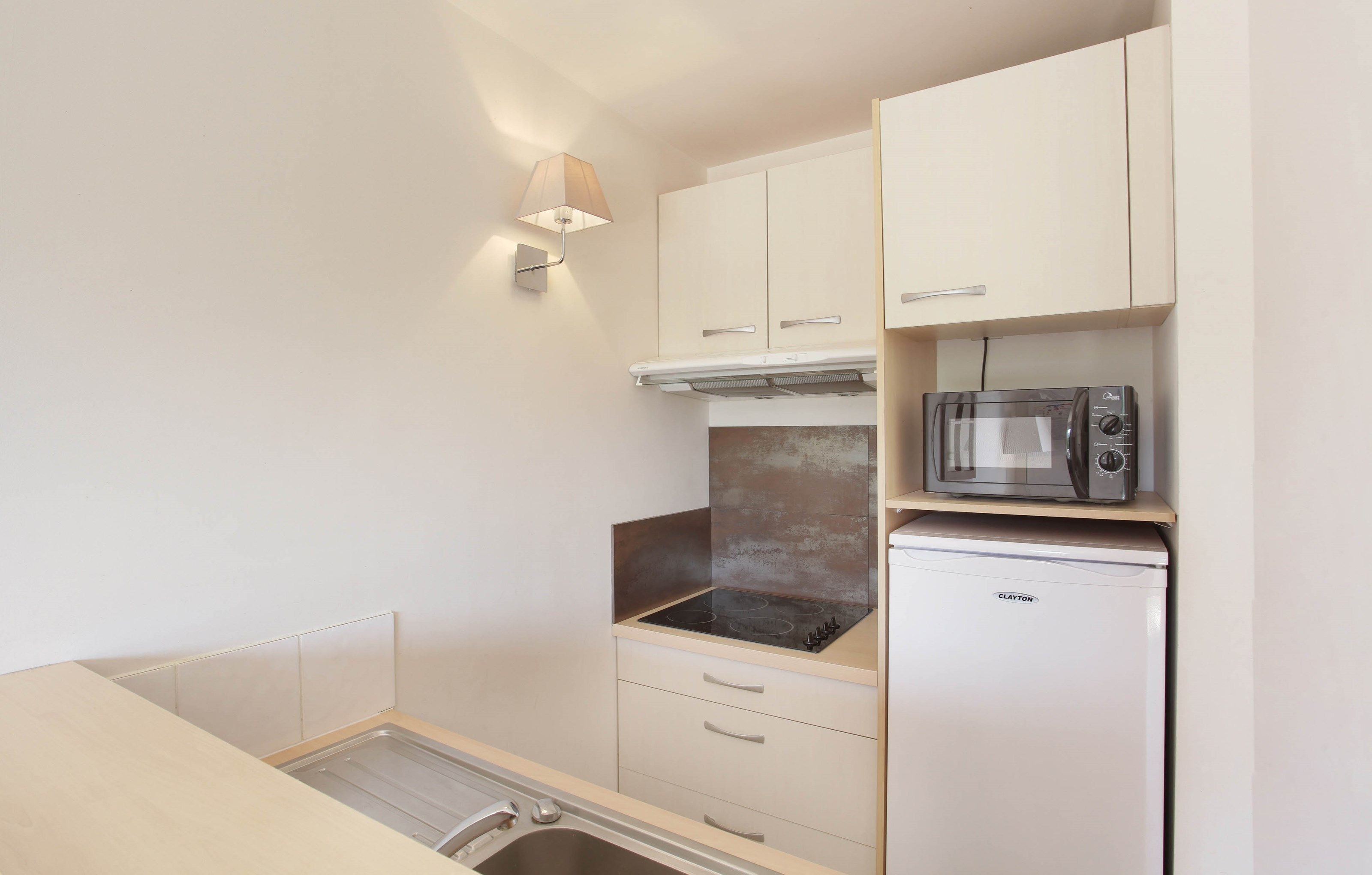 image Tuck into a great snack you’ve prepared in your kitchenette.