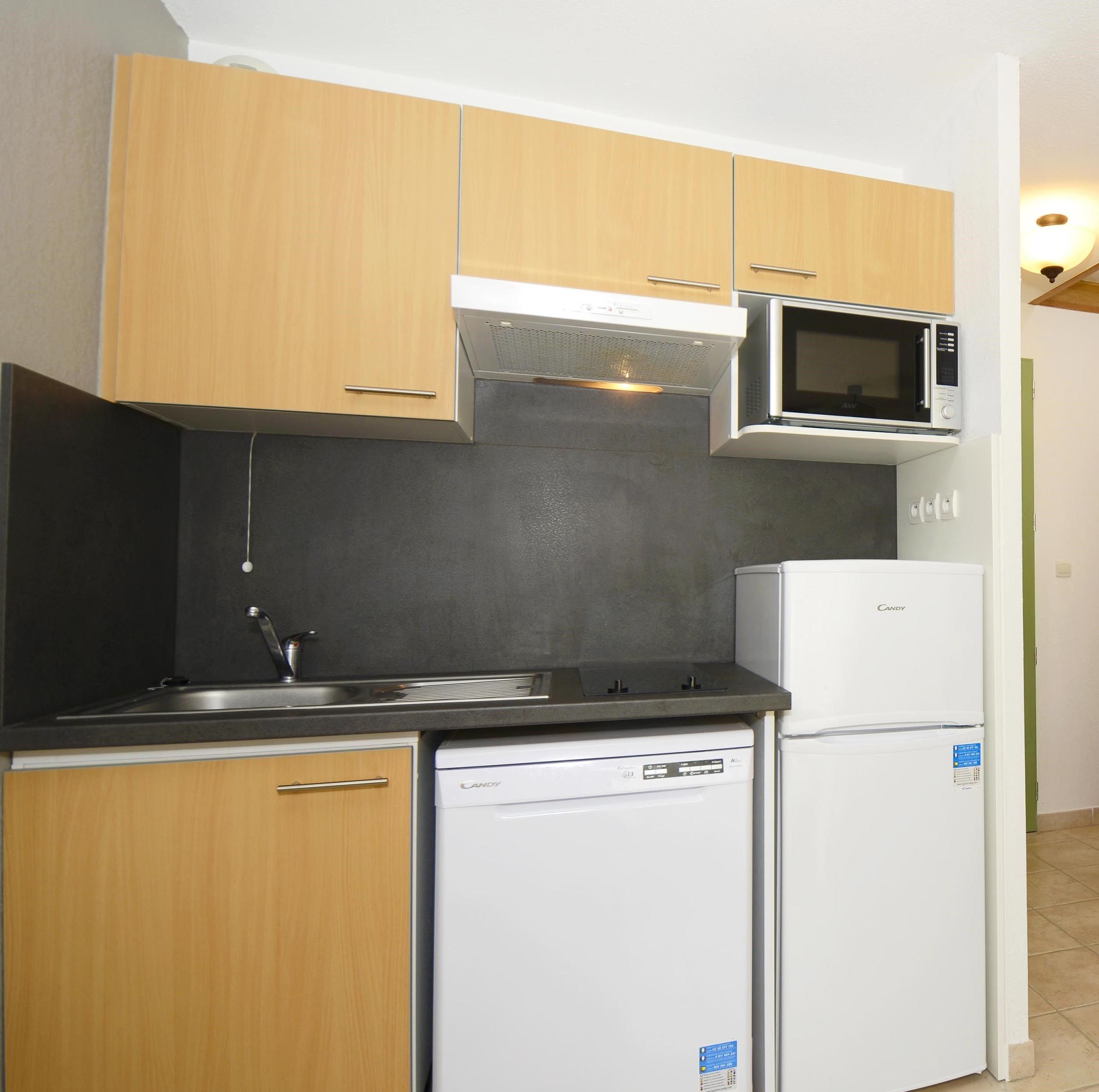 image Curb your appetite by indulging on a snack in your kitchenette!