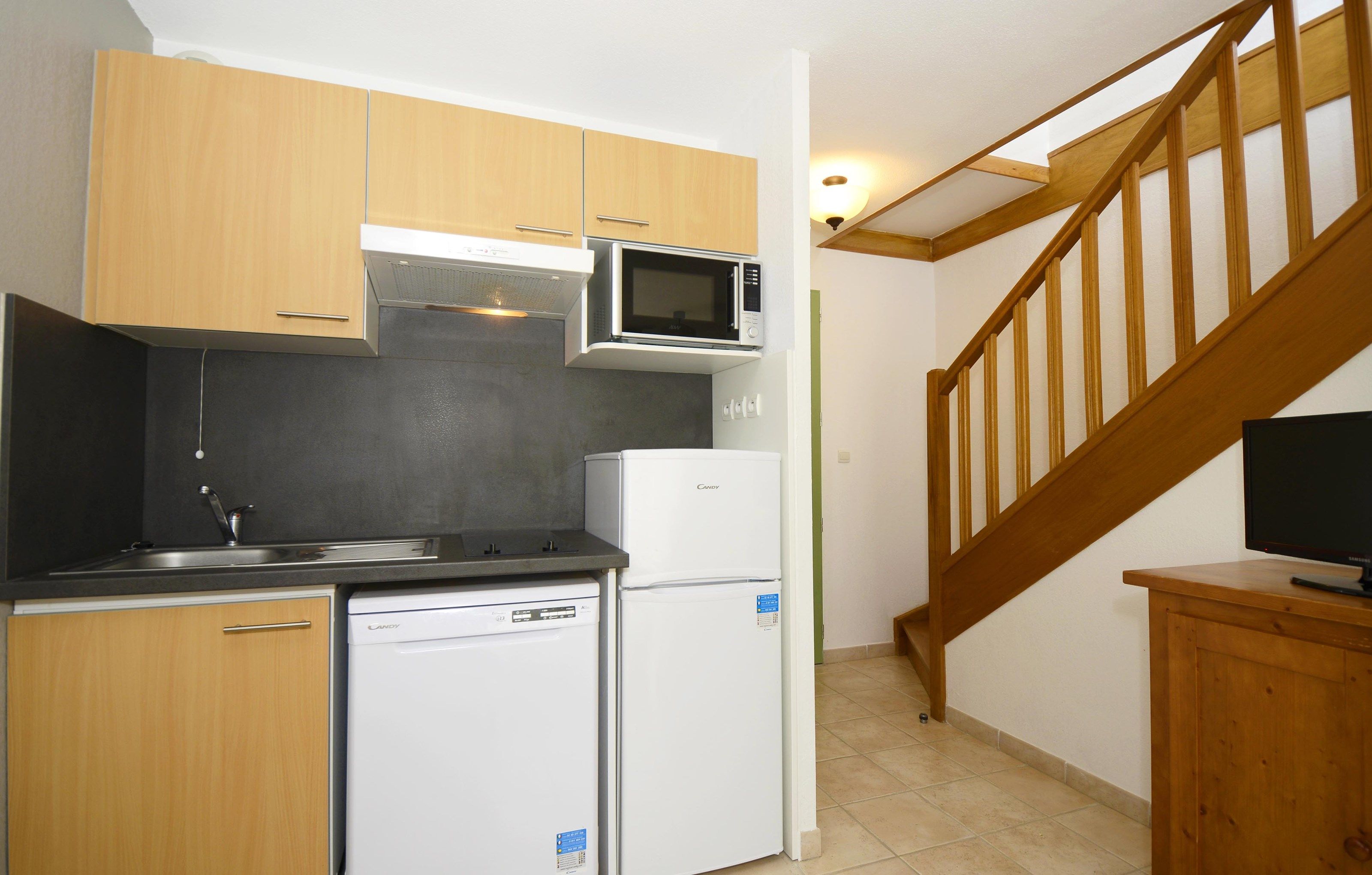 image Curb your appetite by indulging on a snack in your kitchenette!