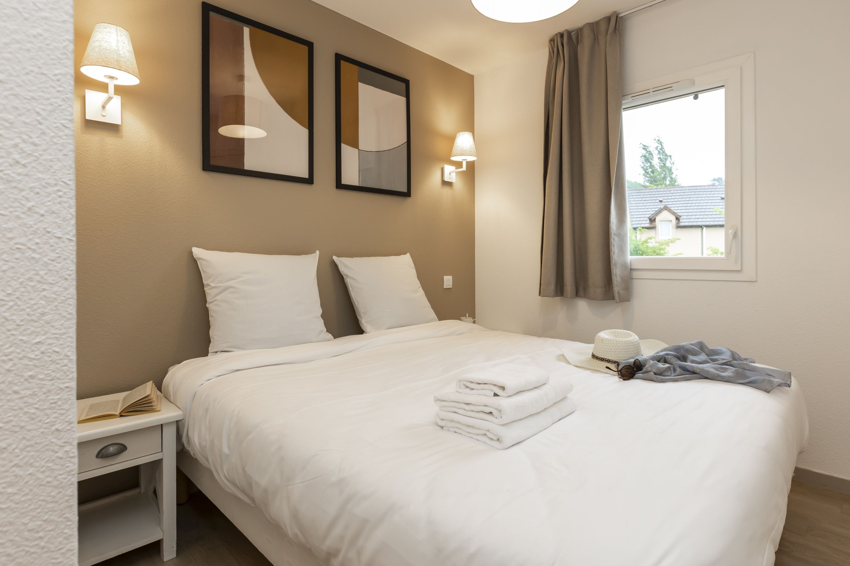 image Drift to sleep in a comfortable bed after a wonderful day outside.