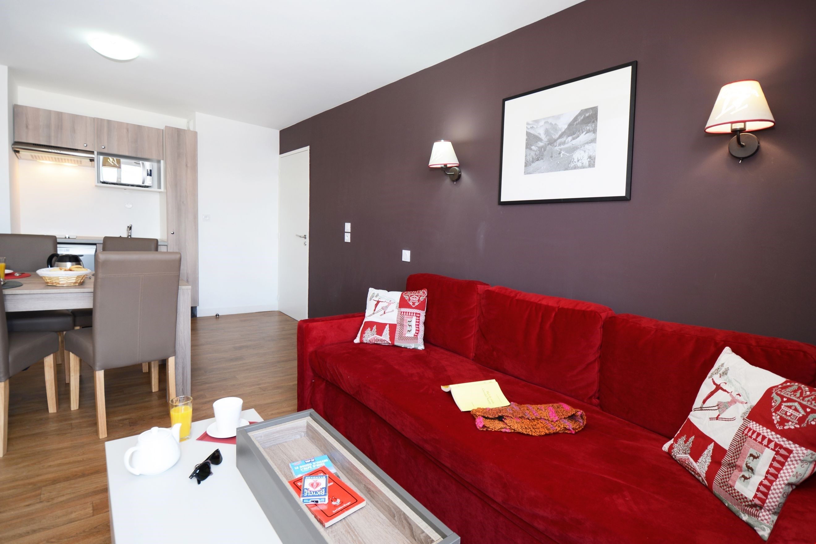 image Sink into the plush sofas and watch the TV with your group at the end of a long day outside.