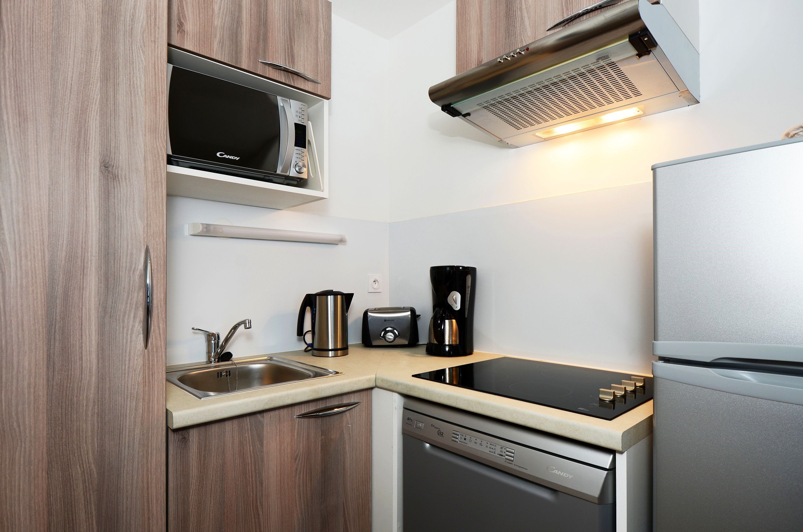 image Prepare delicious meals in your unit's equipped kitchenette.