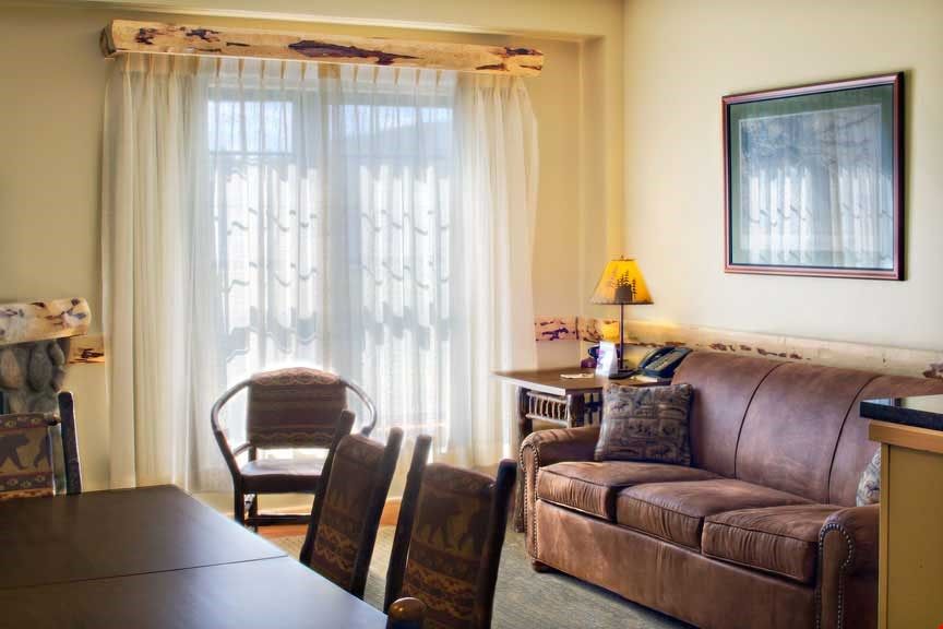 image After a long day outside, sink into the plush sofa and enjoy relaxing with your group