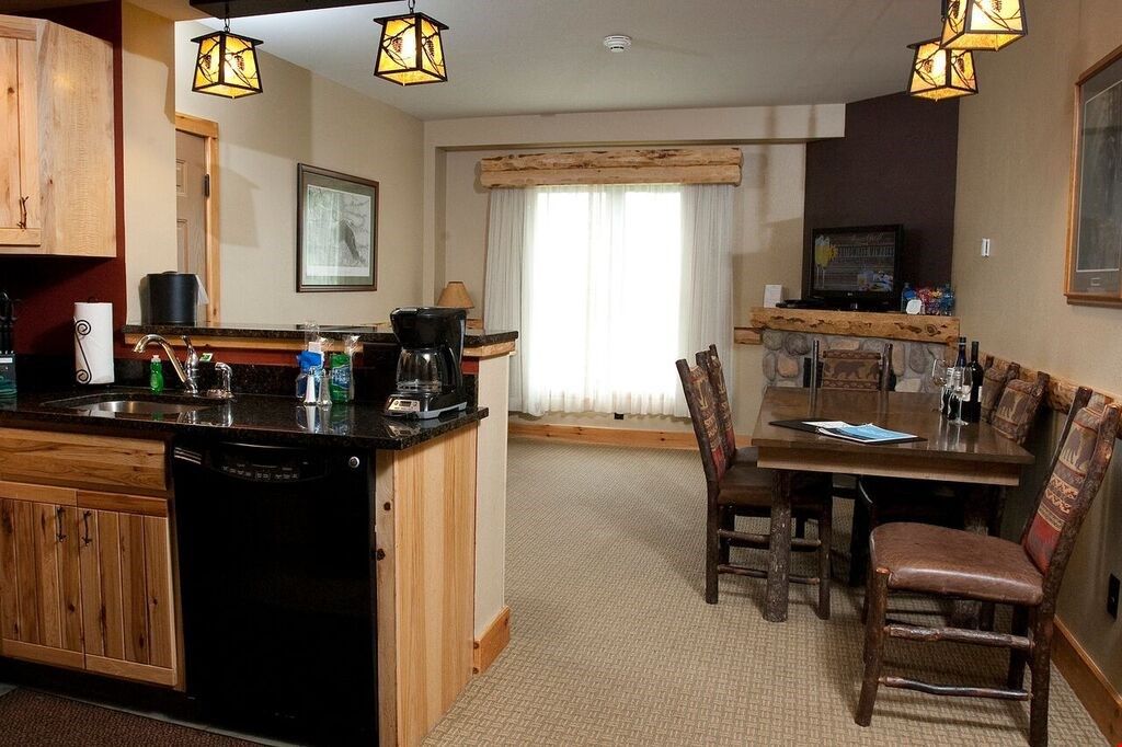image The beautiful open plan living area is great for enjoying meals with your group at the dining area