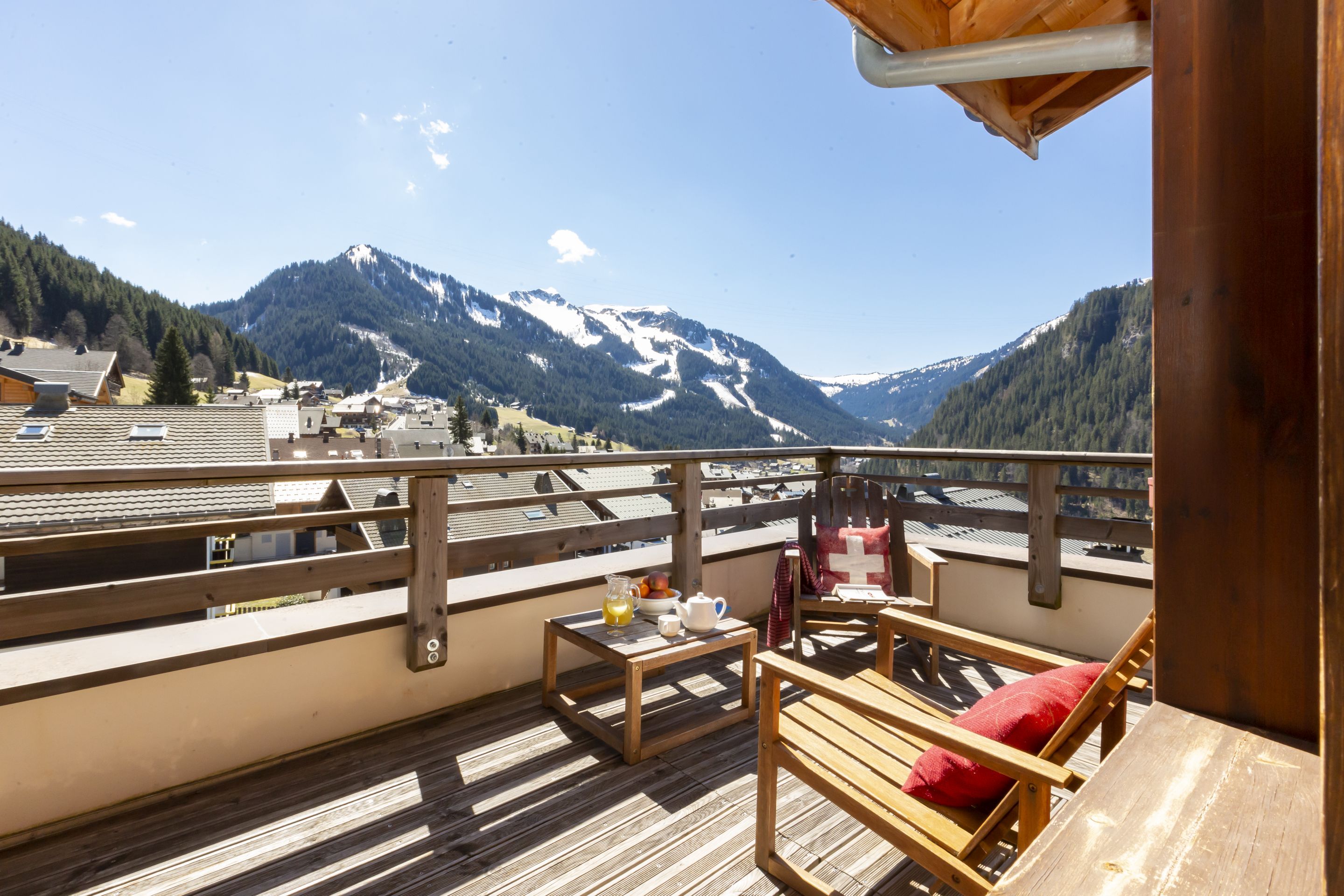 image The furnished balcony looks out over the Châtel valley — a quiet spot for morning coffee before the gondola fills up.