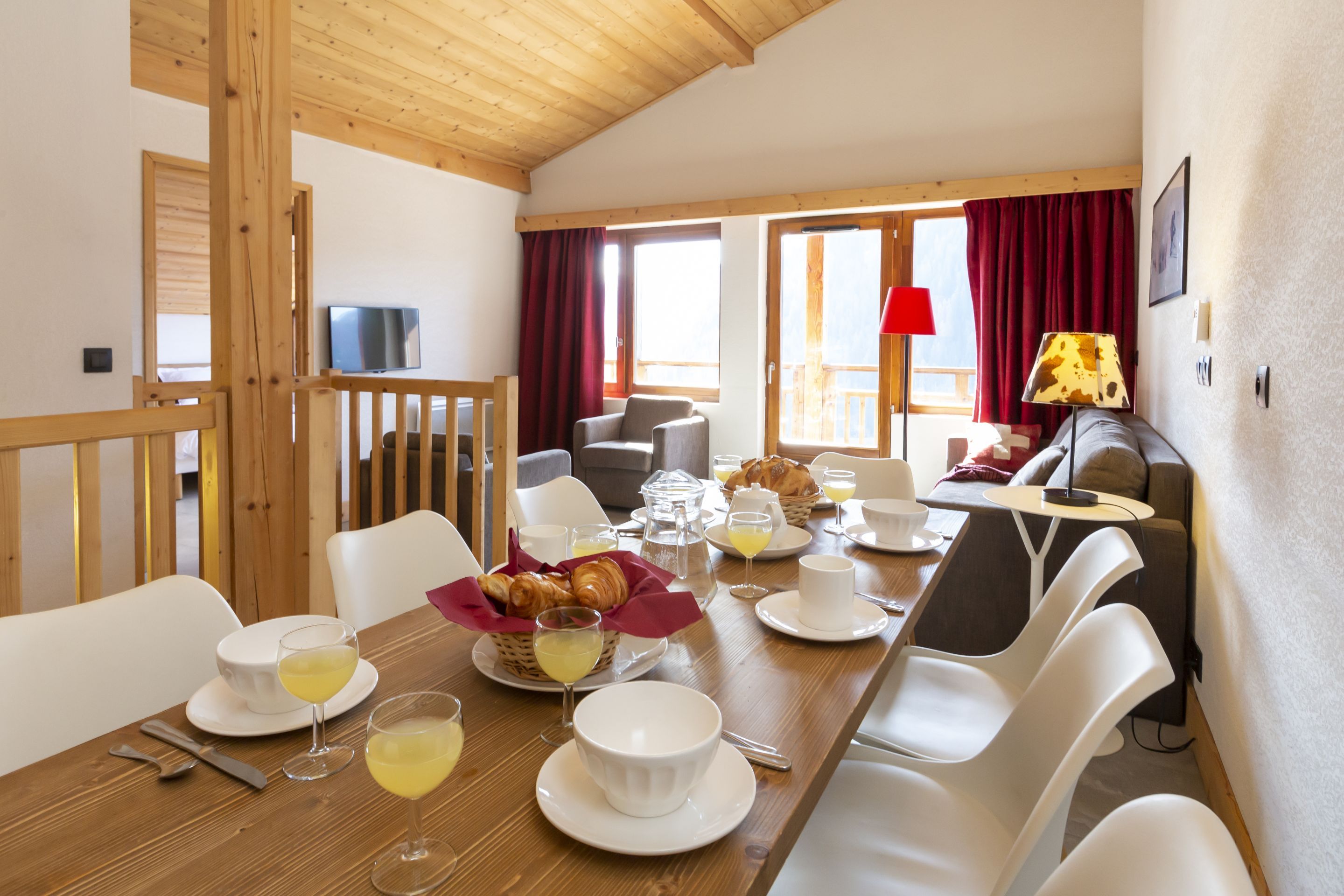 image The spacious dining area with a large table for eight — a proper group setting for evenings in after a day on the Portes du Soleil.