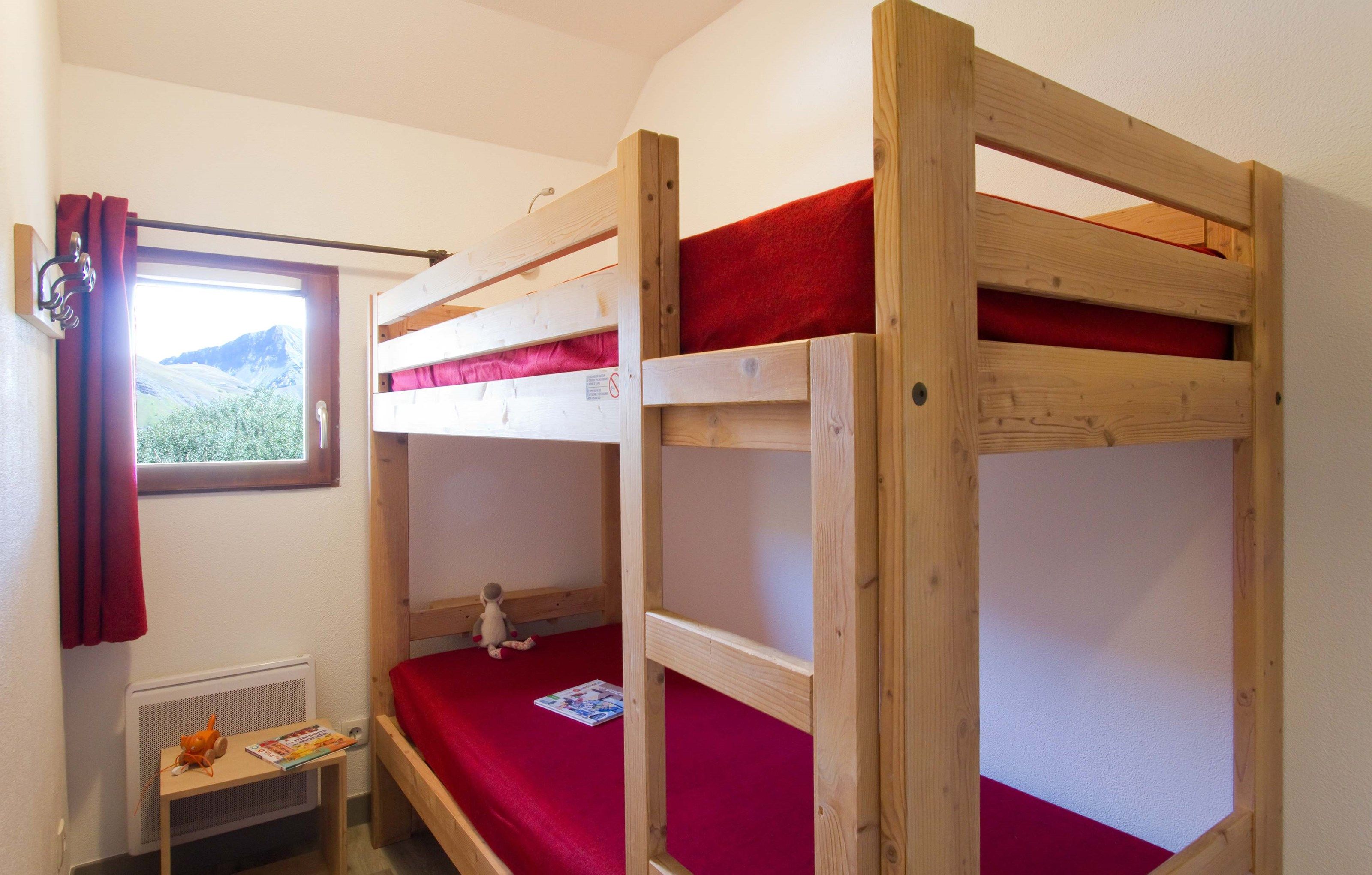 image There's a sleeping area with a bunk bed.