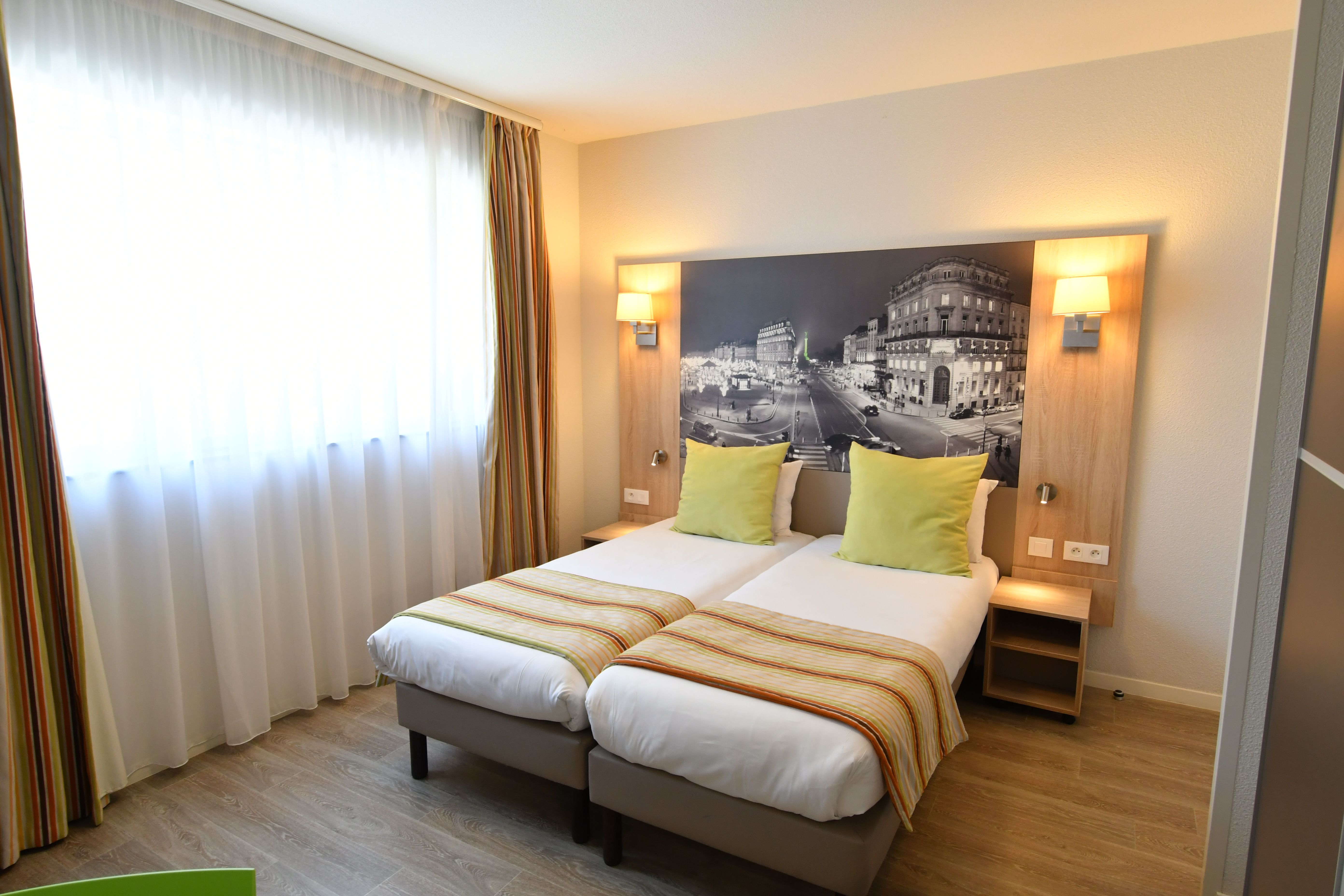 image Cozy twin bedroom with soft light — a simple, relaxing space to relax.