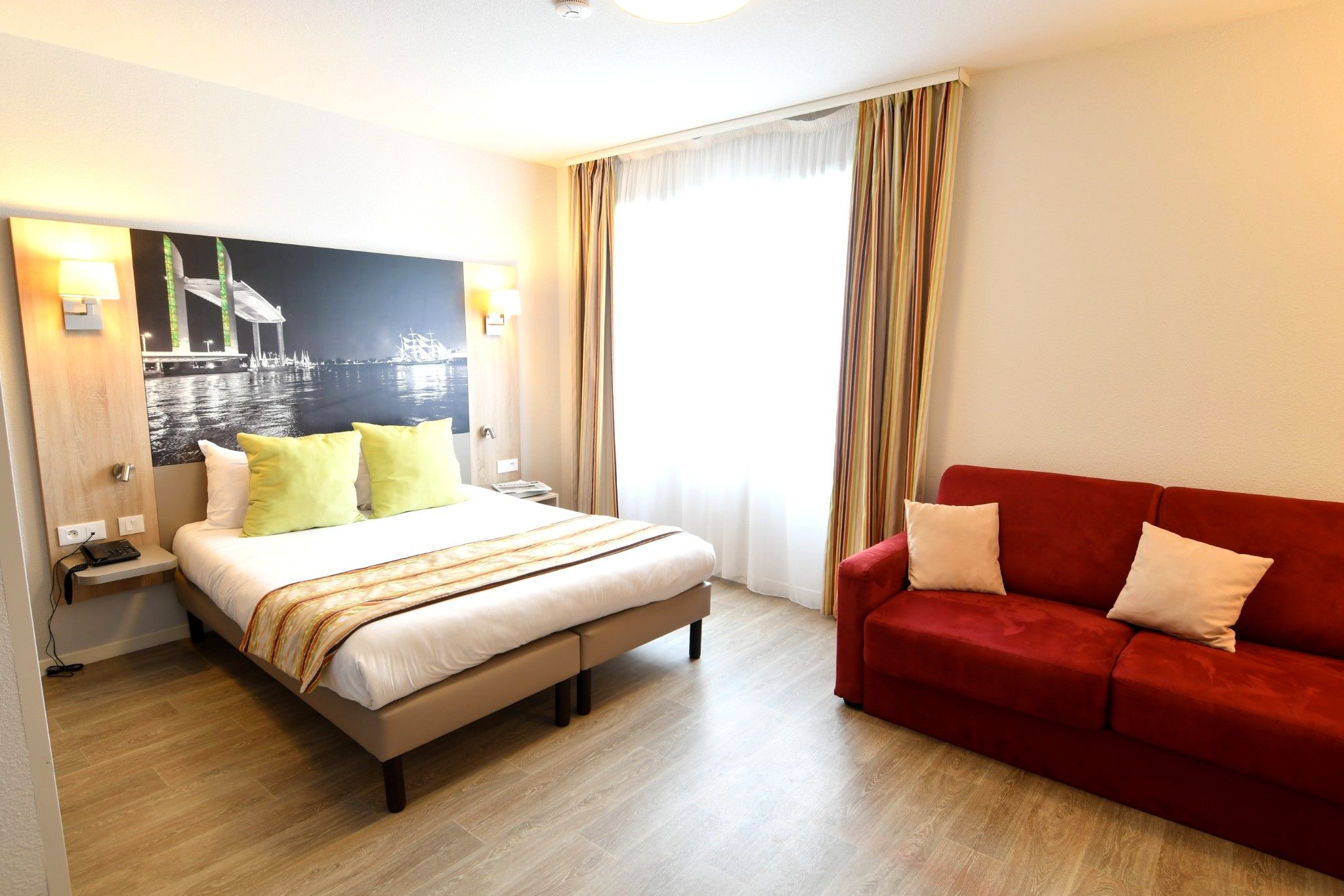 image Bright and comfy bedroom — perfect to unwind after a day out.