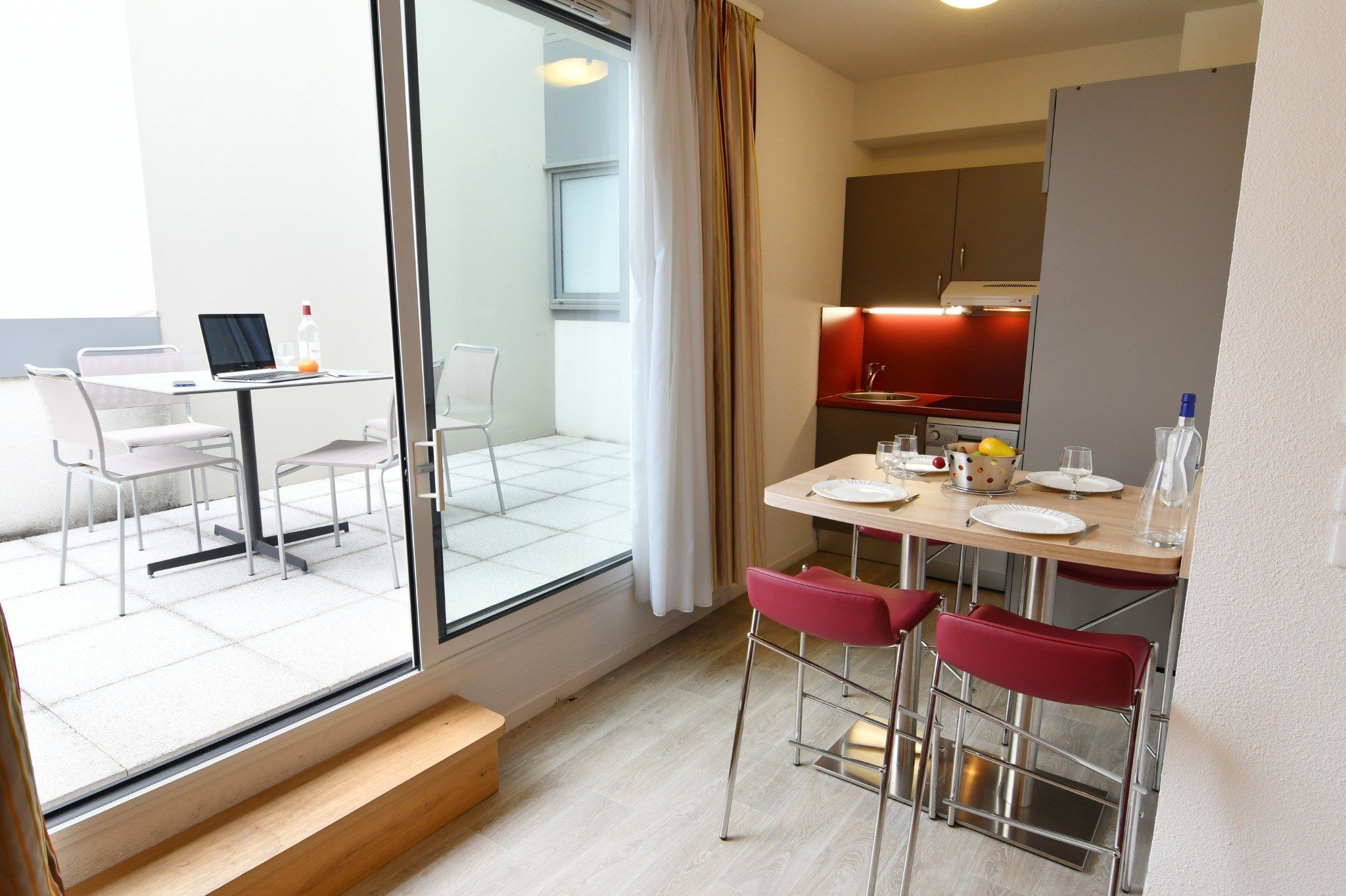 image Enjoy a meal outside on the balcony or patio.