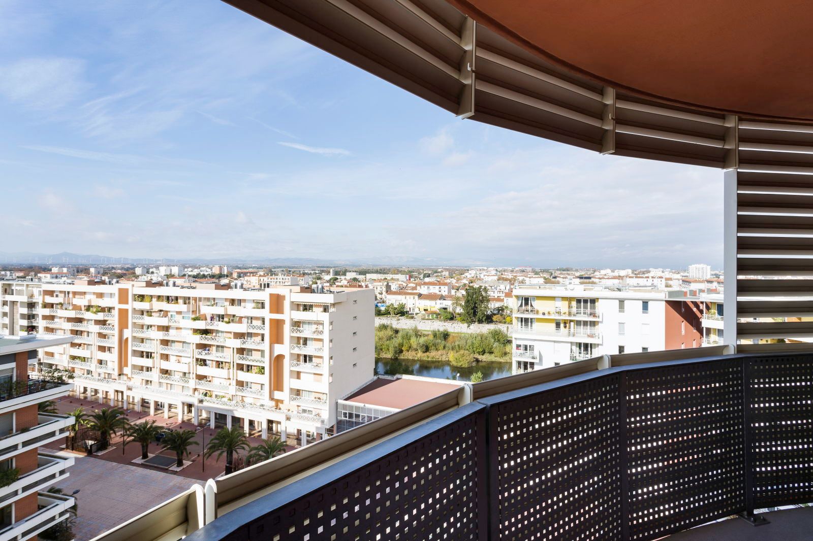 image Balcony offers a panoramic view of the surrounding area and distant mountains