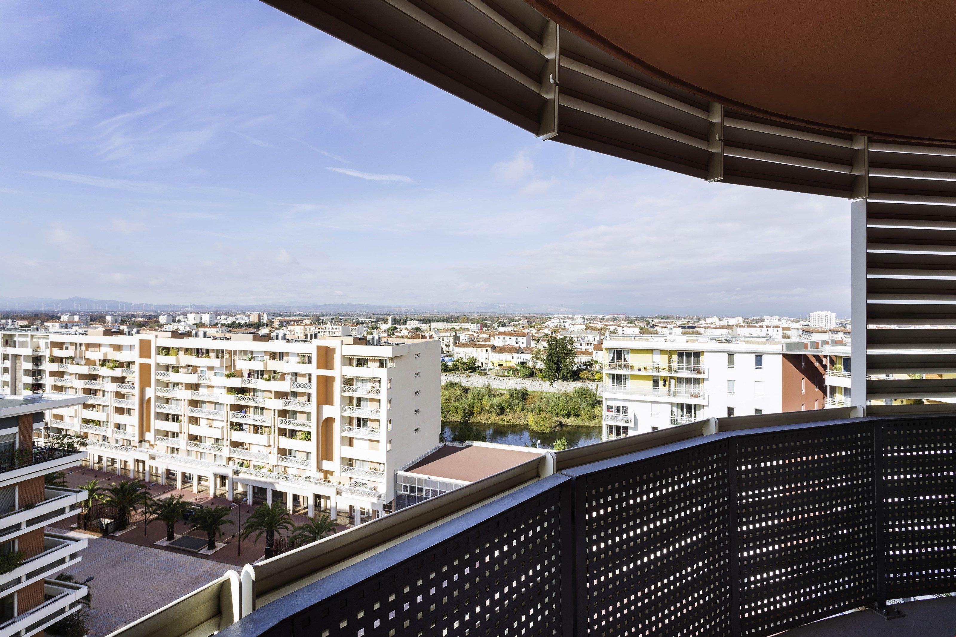 image Step out onto the private balcony and enjoy views of the surrounding area. Views vary.