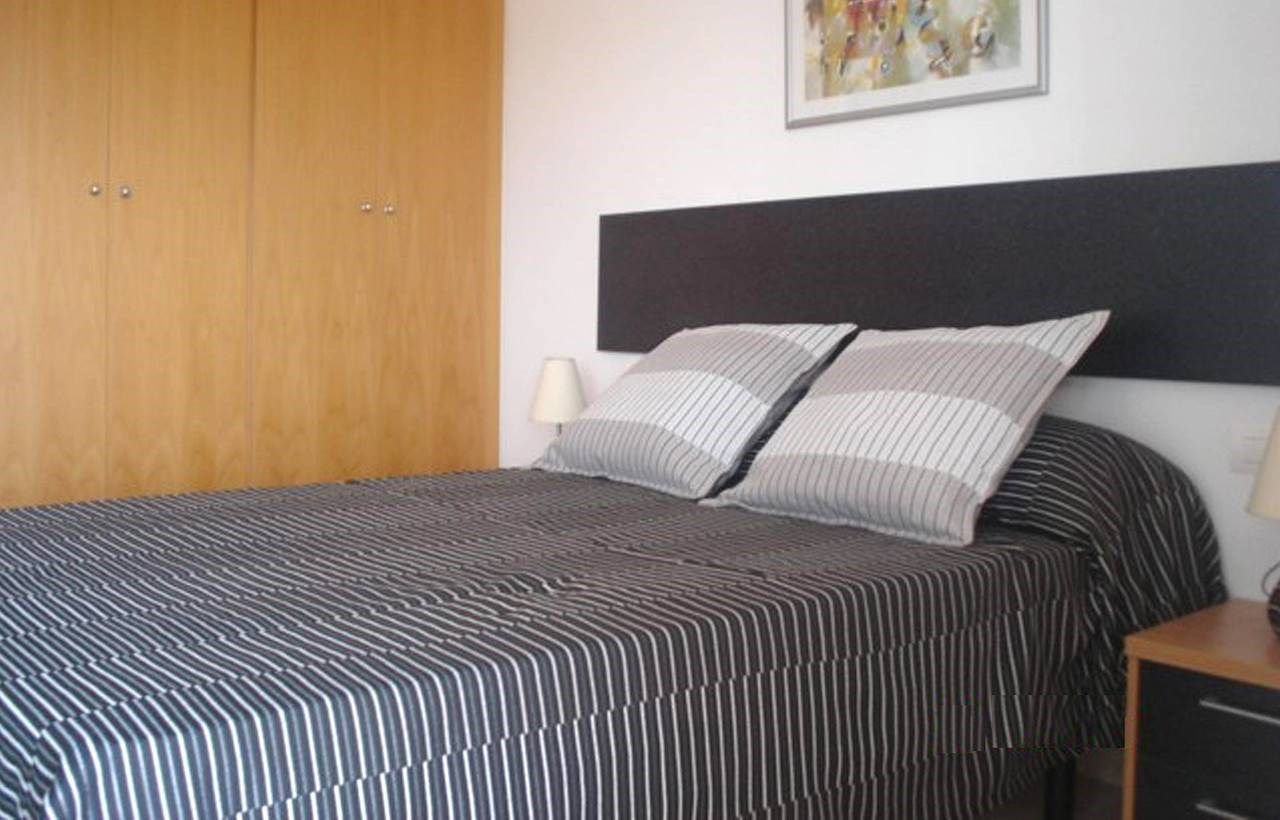 image Drift off to sleep in the plush Double bed in the first bedroom.