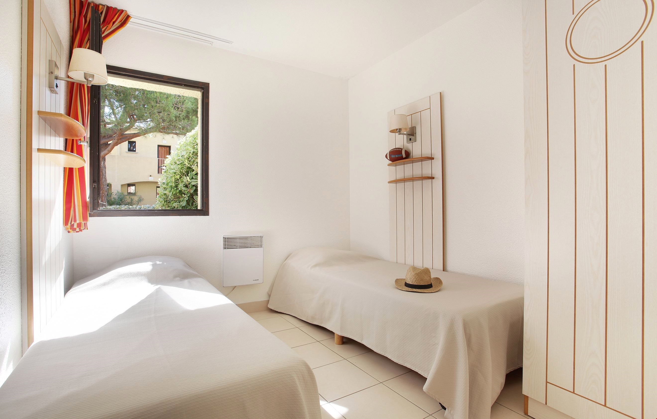 image The master bedroom contains 2 comfortable single beds.