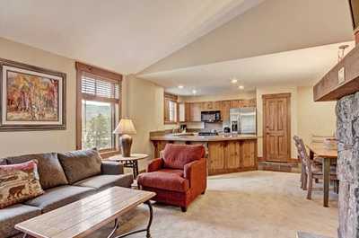 Warm up by the fireplace or entertain at the dining table.