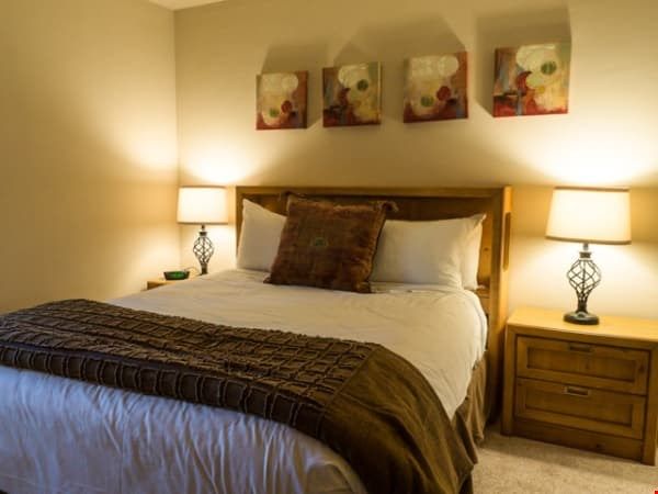 image Get a good night's sleep in the master bedroom.