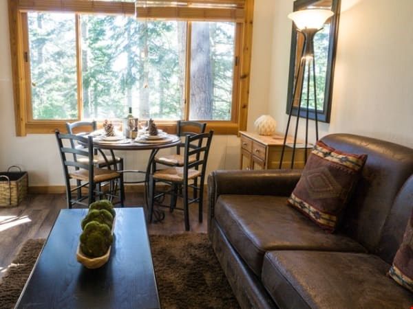 image Kick back your feet and relax in the spacious, bright living room.