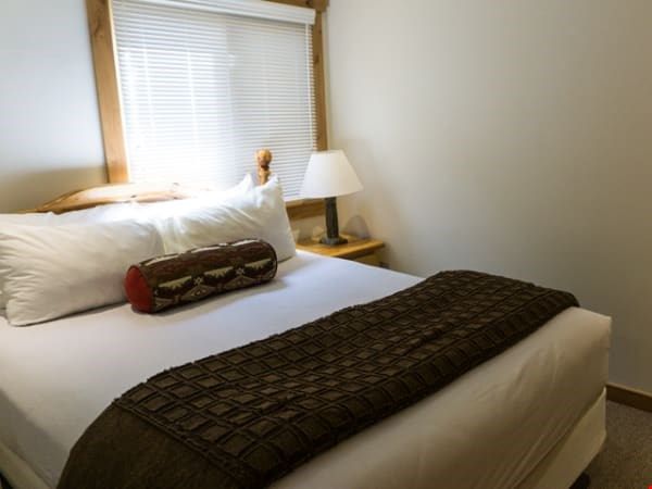 image Get a good night's sleep in the master bedroom.