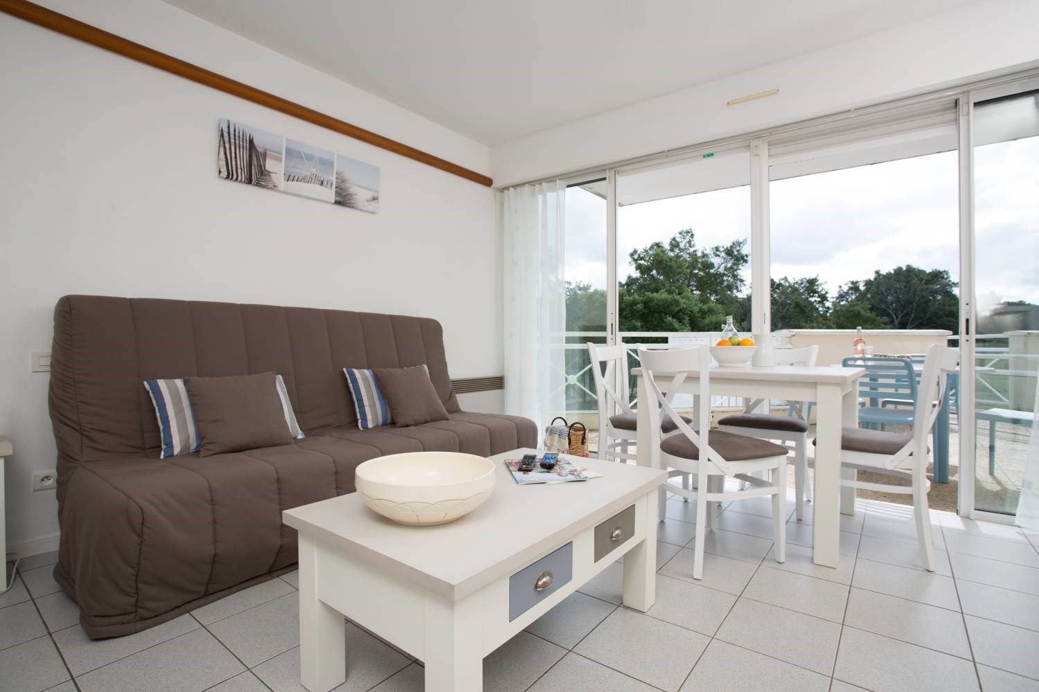 image You will love the bright and spacious living area, perfect for relaxing after a day outside.