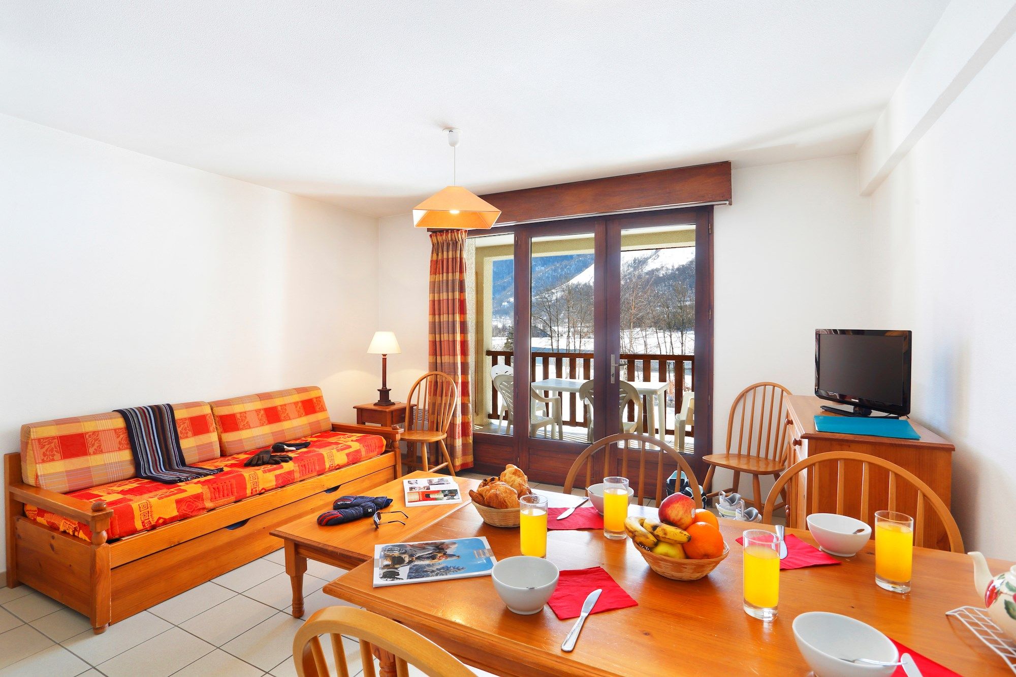 image The living area is bright and cozy, perfect for relaxing after a wonderful day.