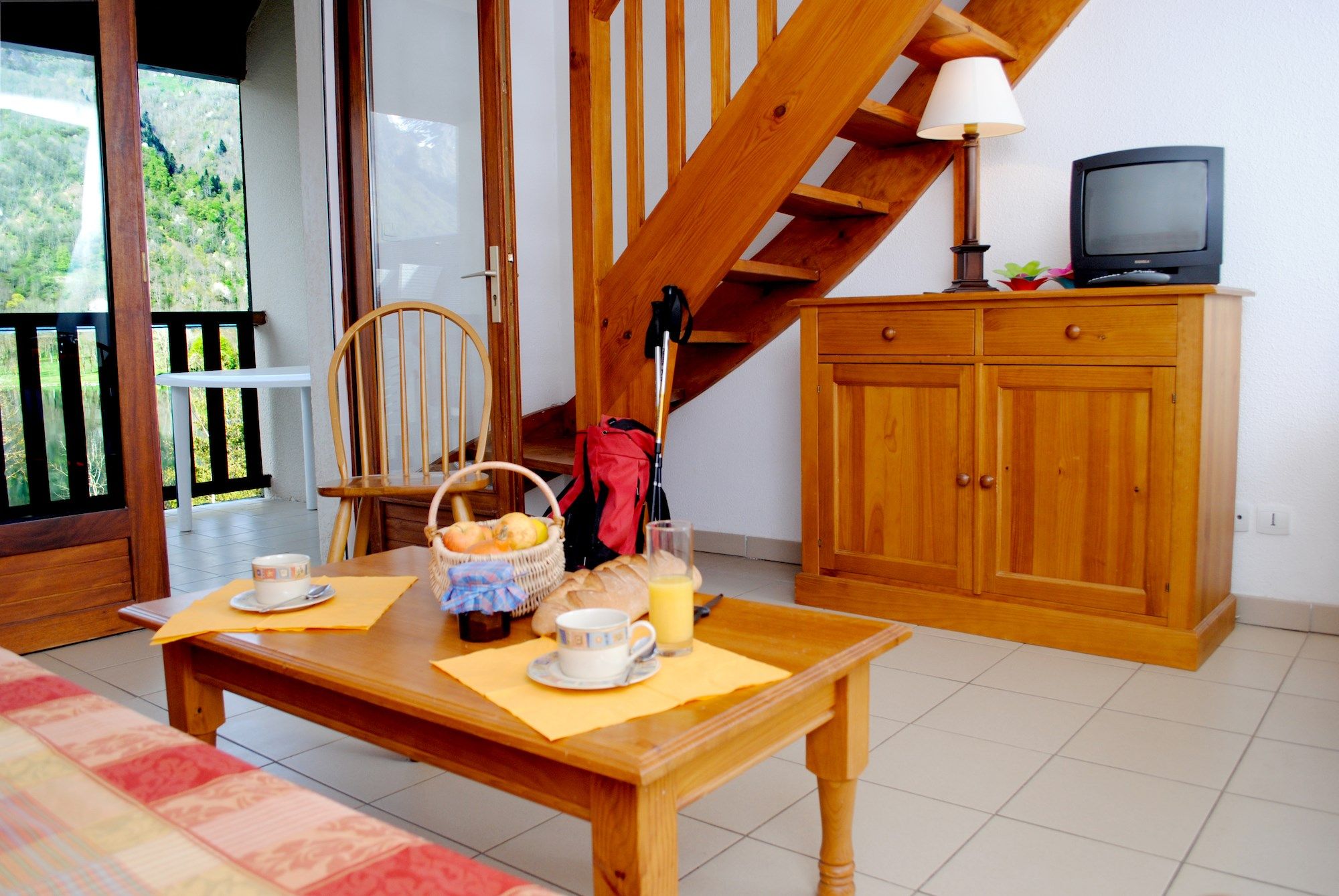 image Our apartment has bedrooms upstairs, providing ample space for your group.