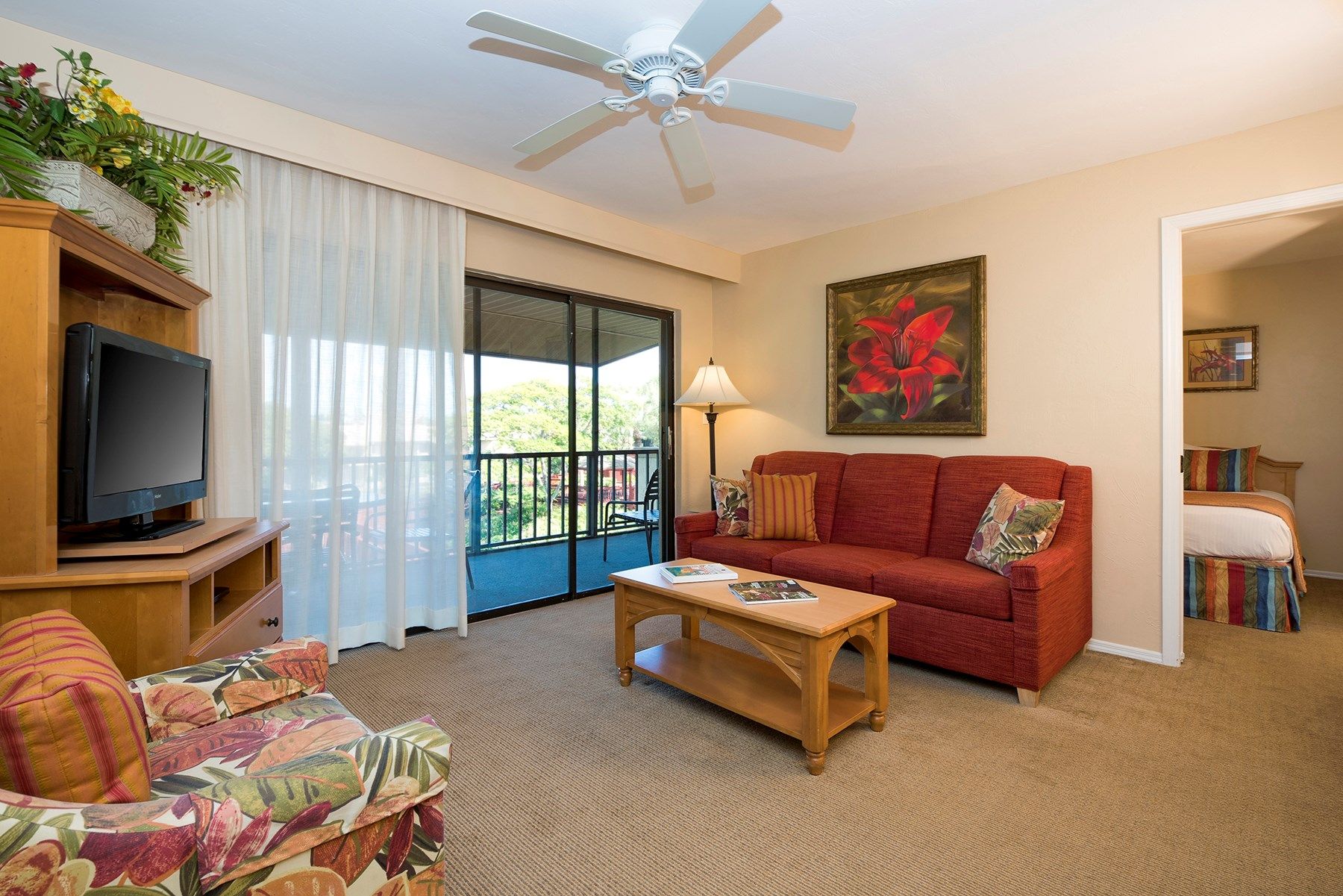 image Find peace and relaxation with your close friends and family in this stunning living room featuring natural decor.