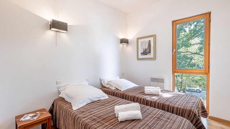 image Drift to sleep in the Double bed or 2 Single beds in the bedroom - let us know what you prefer! Please note that lake views are not guaranteed.