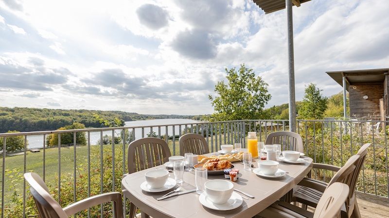 image Sit out on your furnished terrace and enjoy a glass of wine in the warm sunshine. Please note that lake views are not guaranteed.