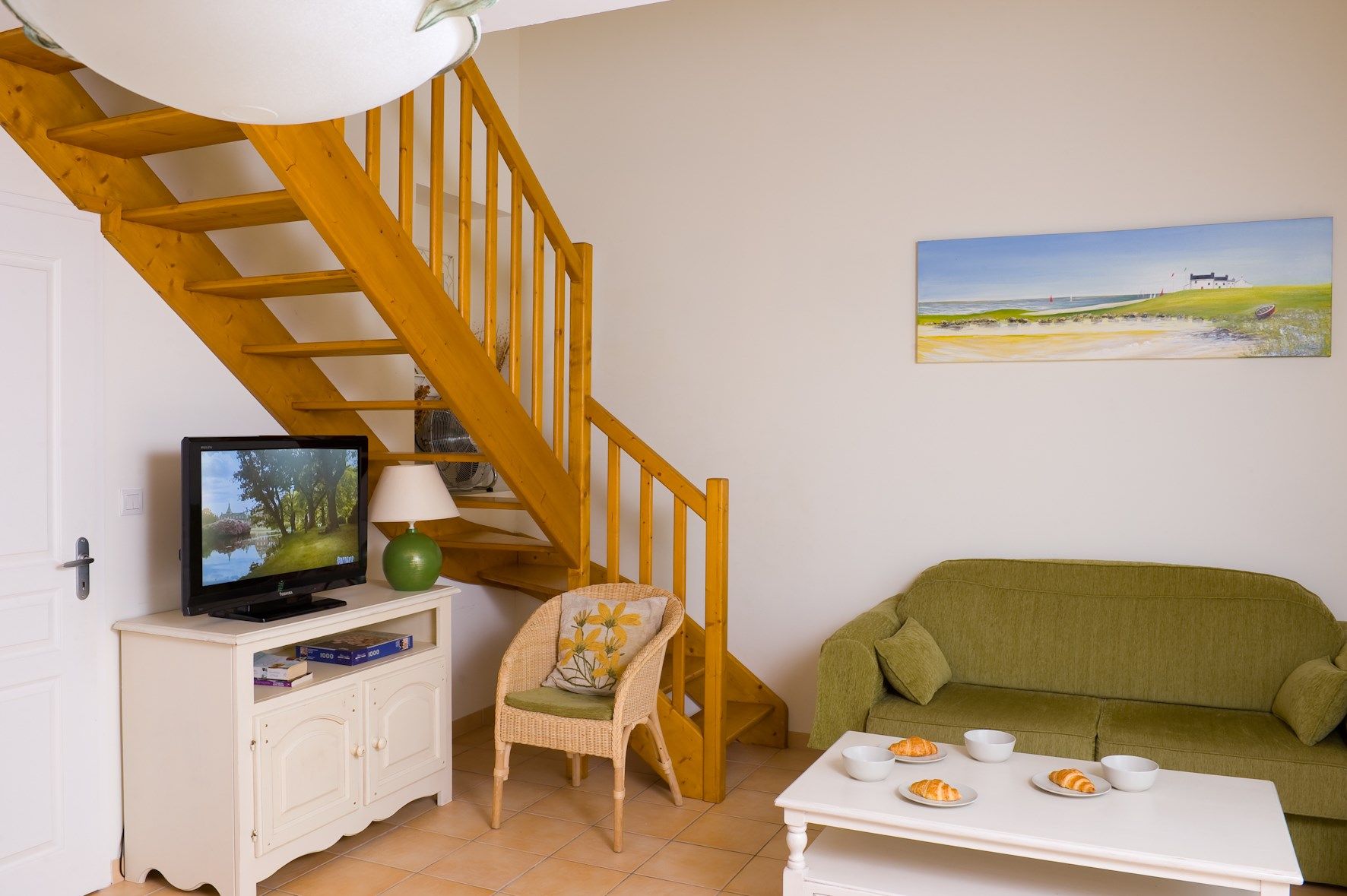 image Sit back in the cozy sofa with a good book, or arrange for TV services for a charge.