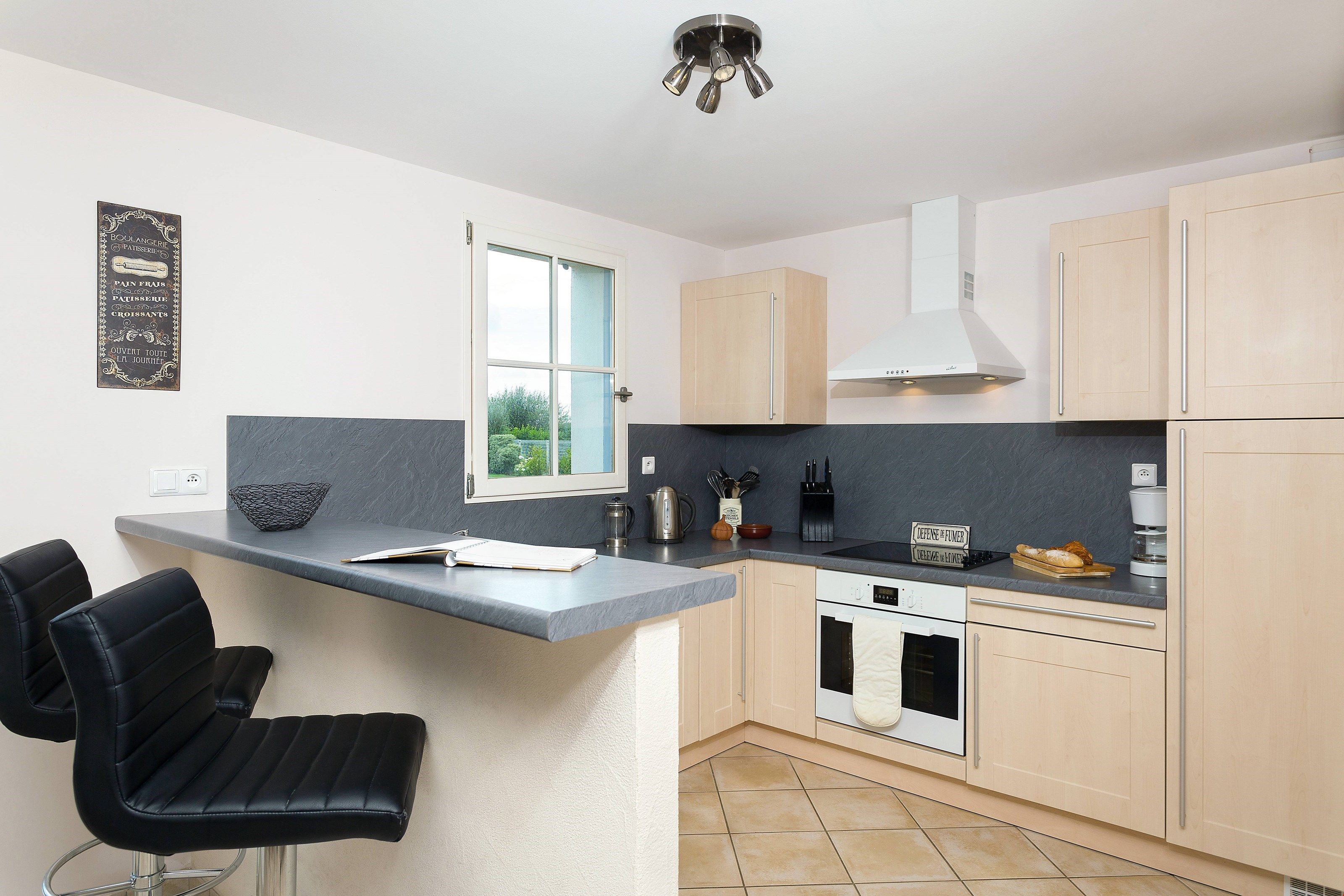 image Prepare meals in the kitchenette with everything you need to cook in the comforts of your villa.