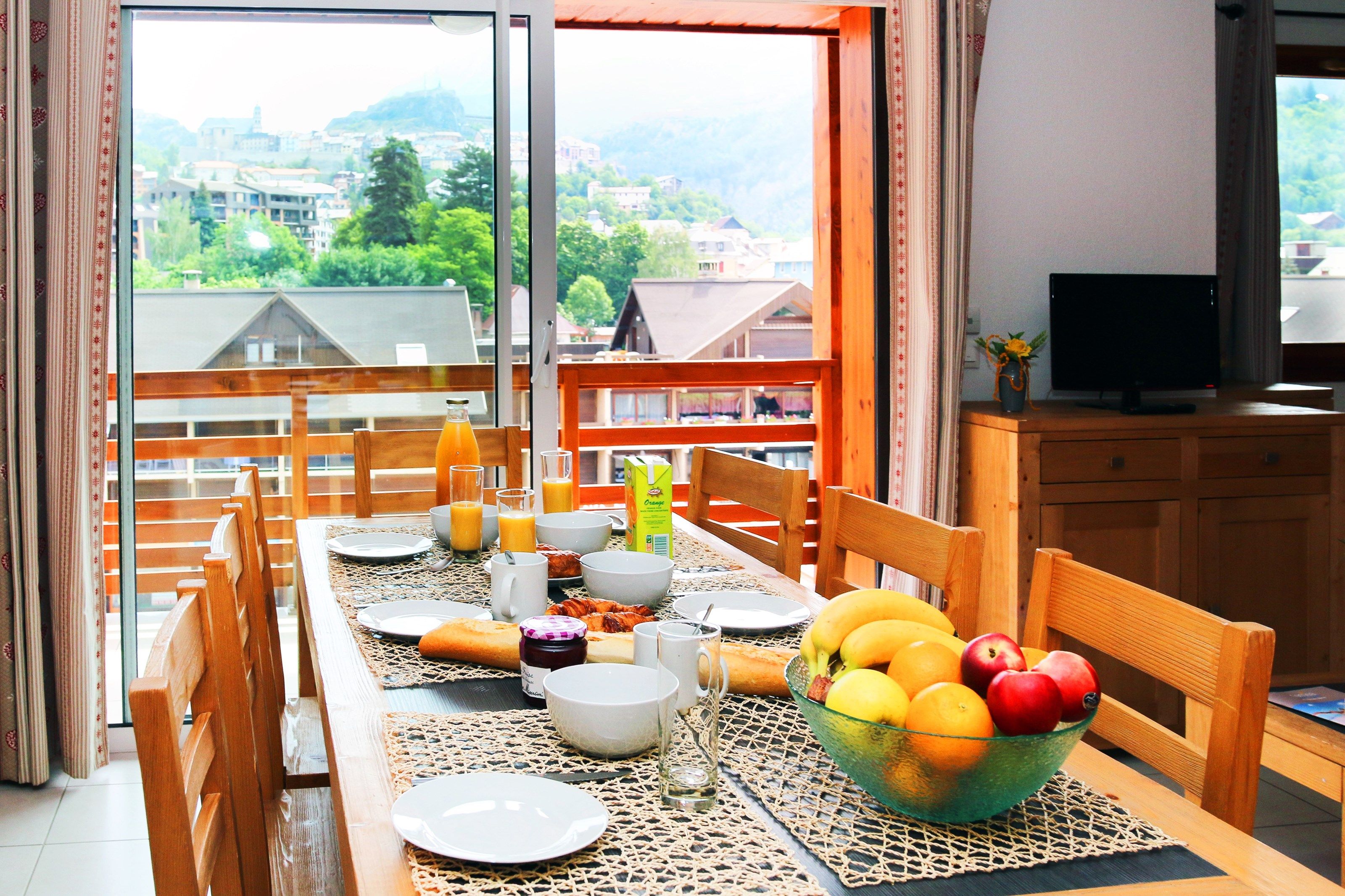 image Share meals at the dining table with seating.