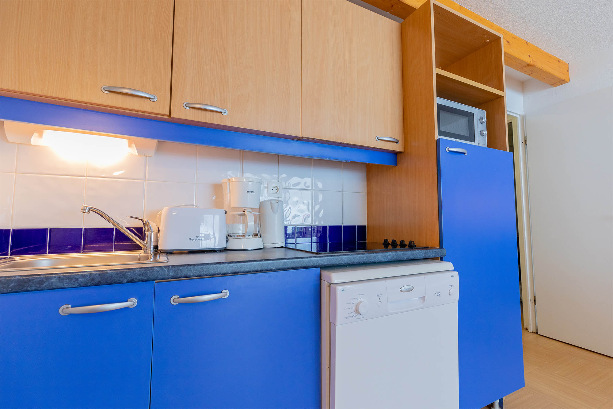 image Kitchen with sink, dishwasher and coffee maker