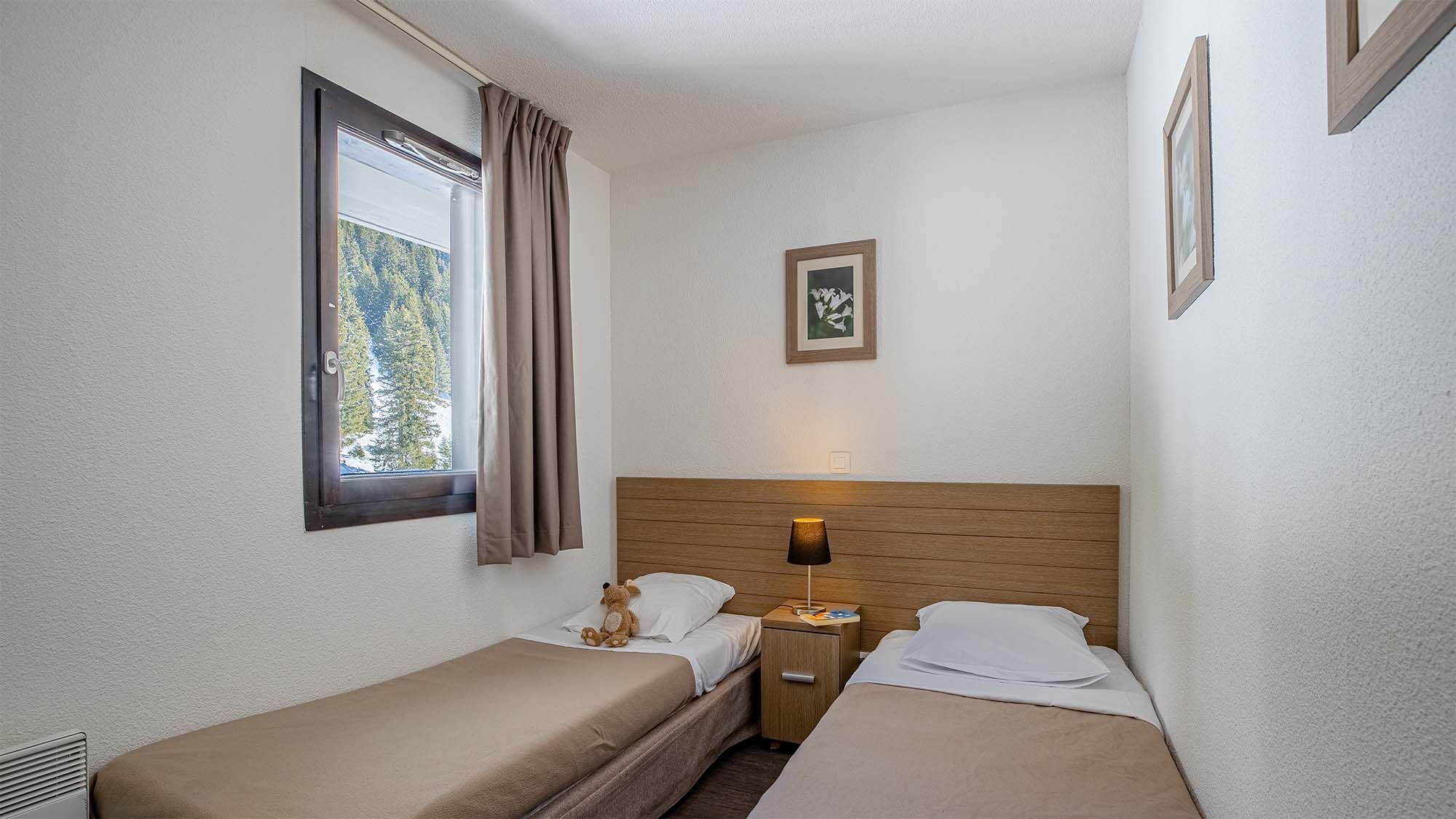 image Surrender to the serenity of our plush beds.