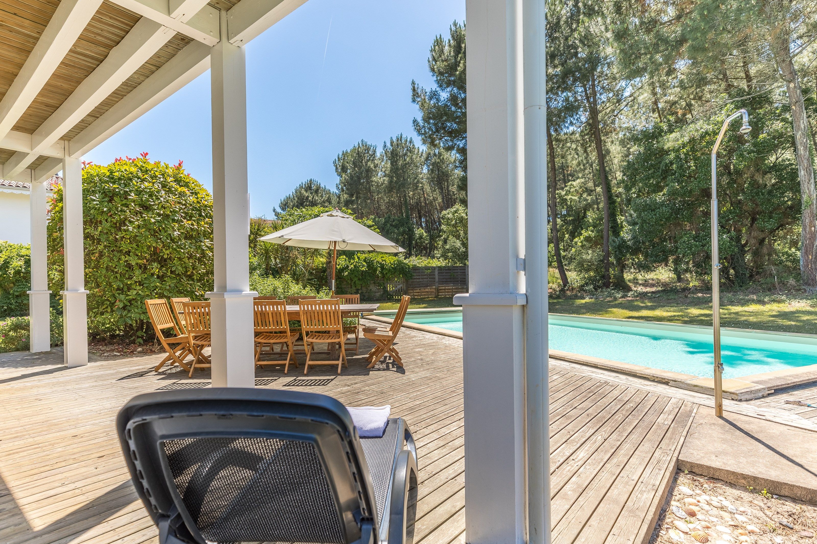 image Enjoy reminiscing about your day while sipping a glass of wine outside on the patio.