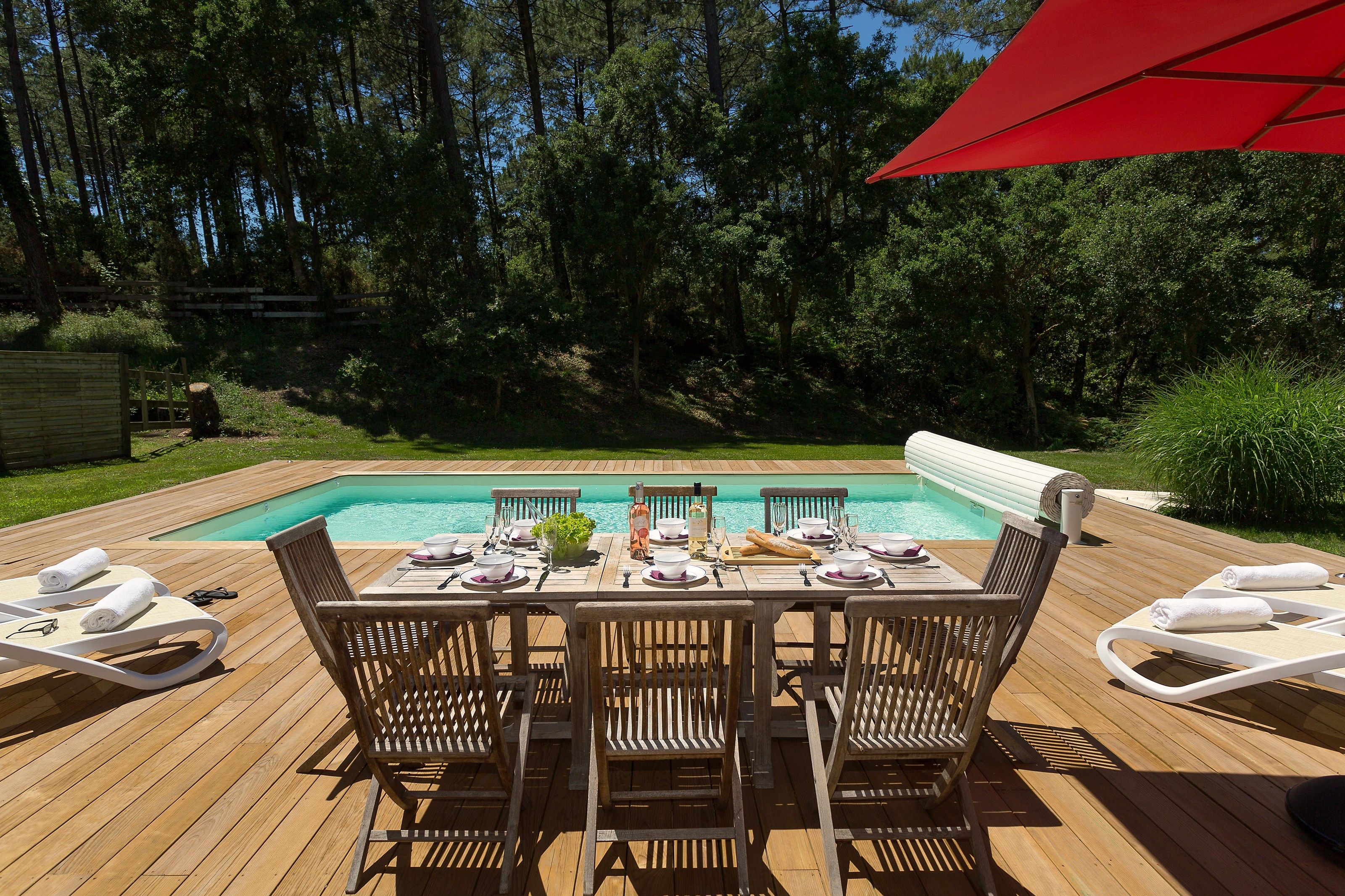 image Enjoy a glass of wine with the sunshine by your private pool!