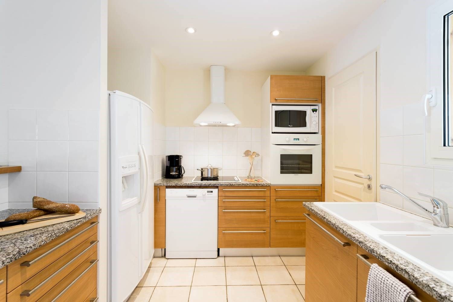 image Curb your appetite by cooking a meal in your kitchen.
