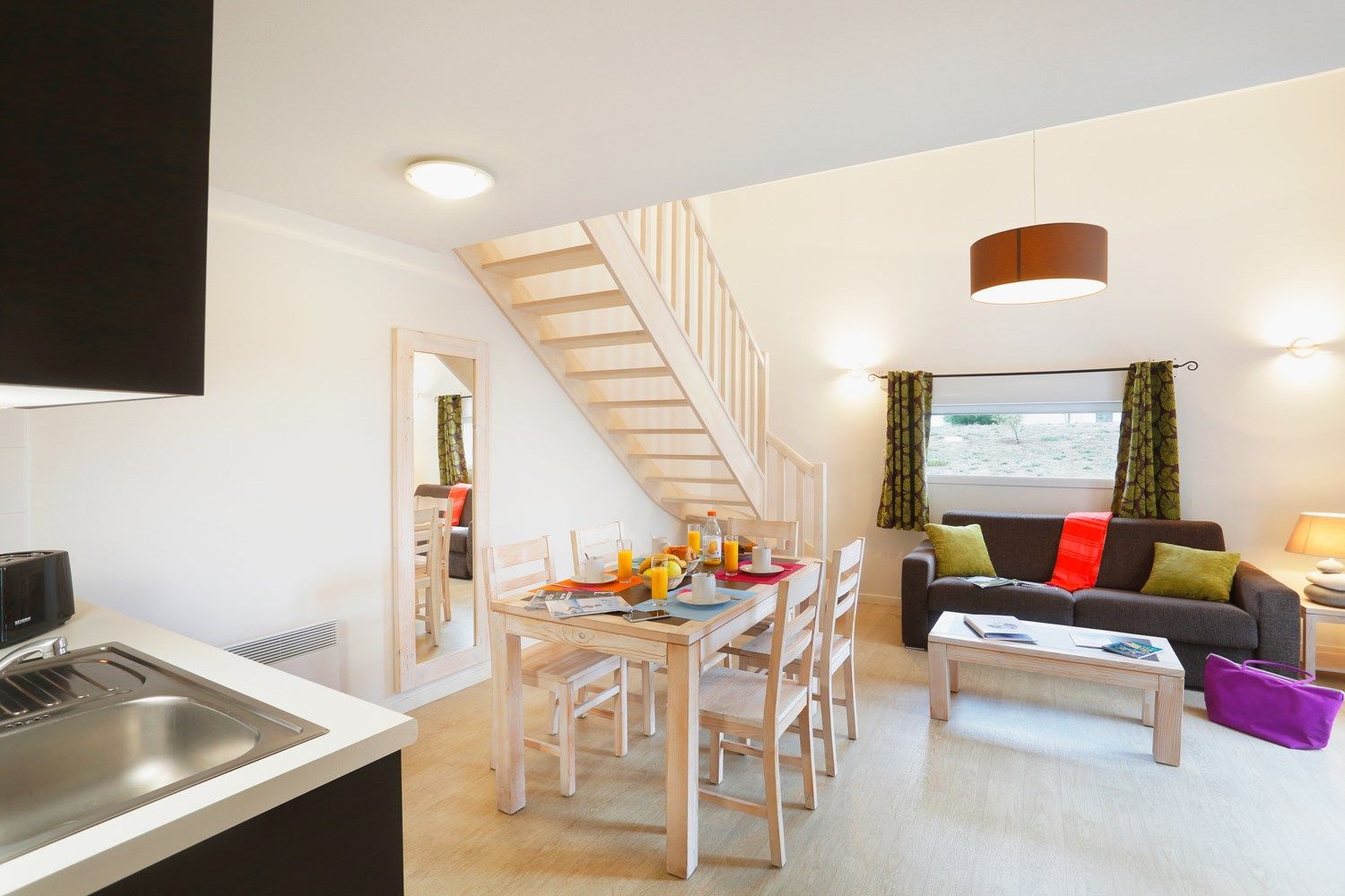 image You will love to sit back and relax in the bright and cozy living room.