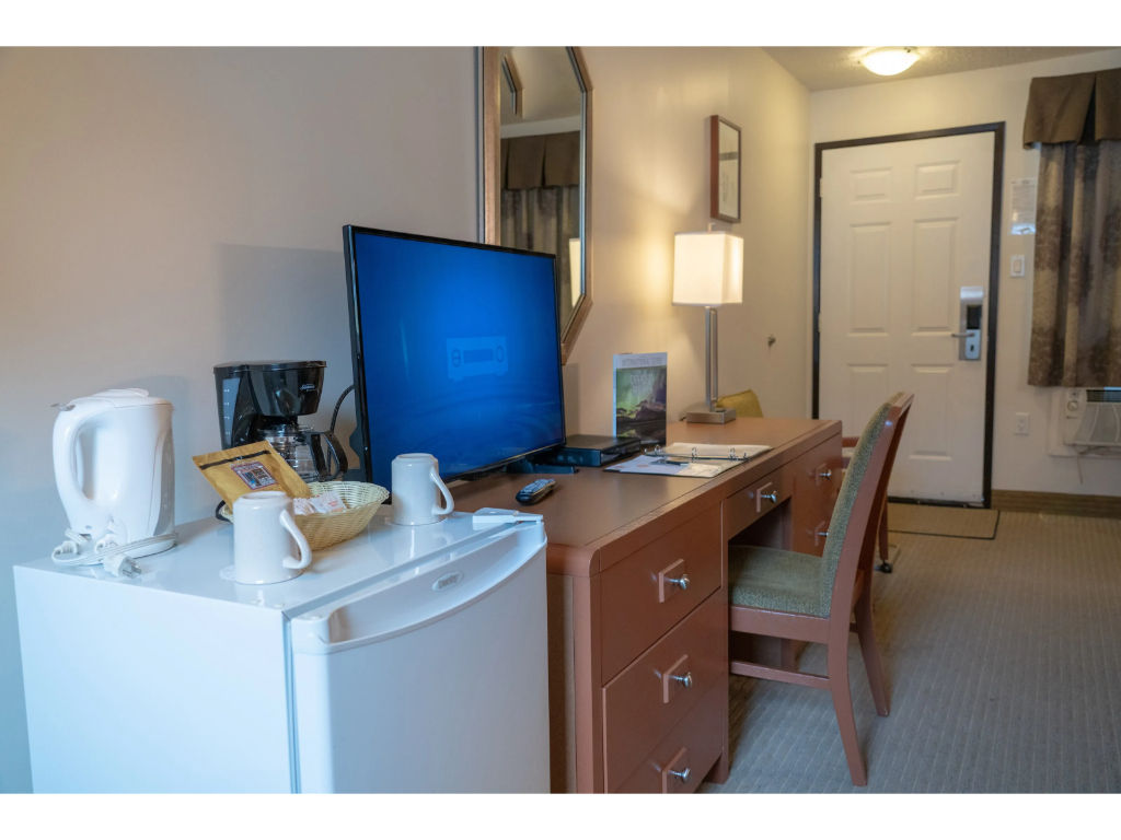 image There is a convenient work desk and chair, along with a mini-fridge in-room.