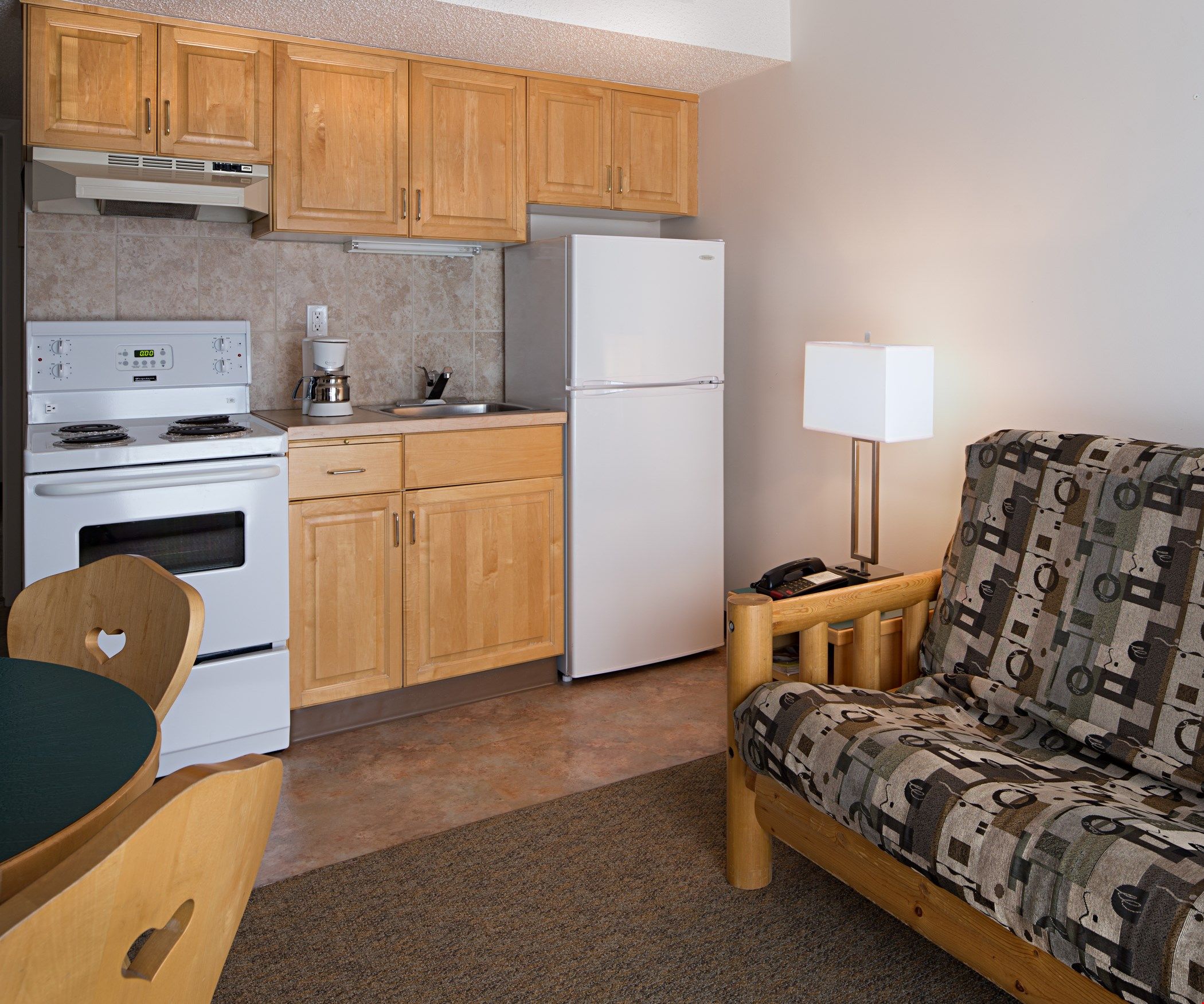 image Cook up a storm in the fully-equipped kitchen with coffeemaker, fridge, and stove.