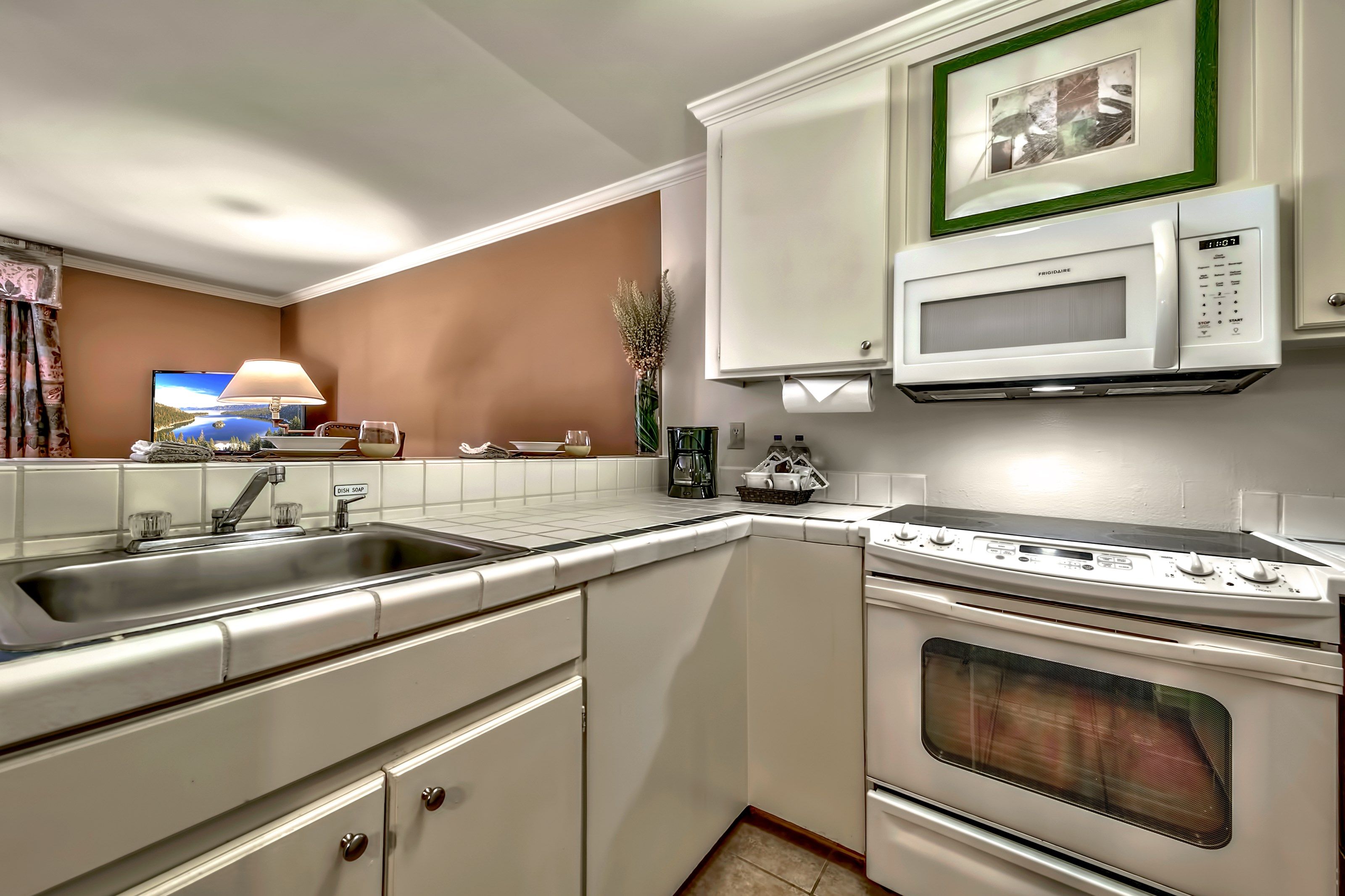 image The fully-equipped kitchen features all the amenities you'd need to make a delicious meal.