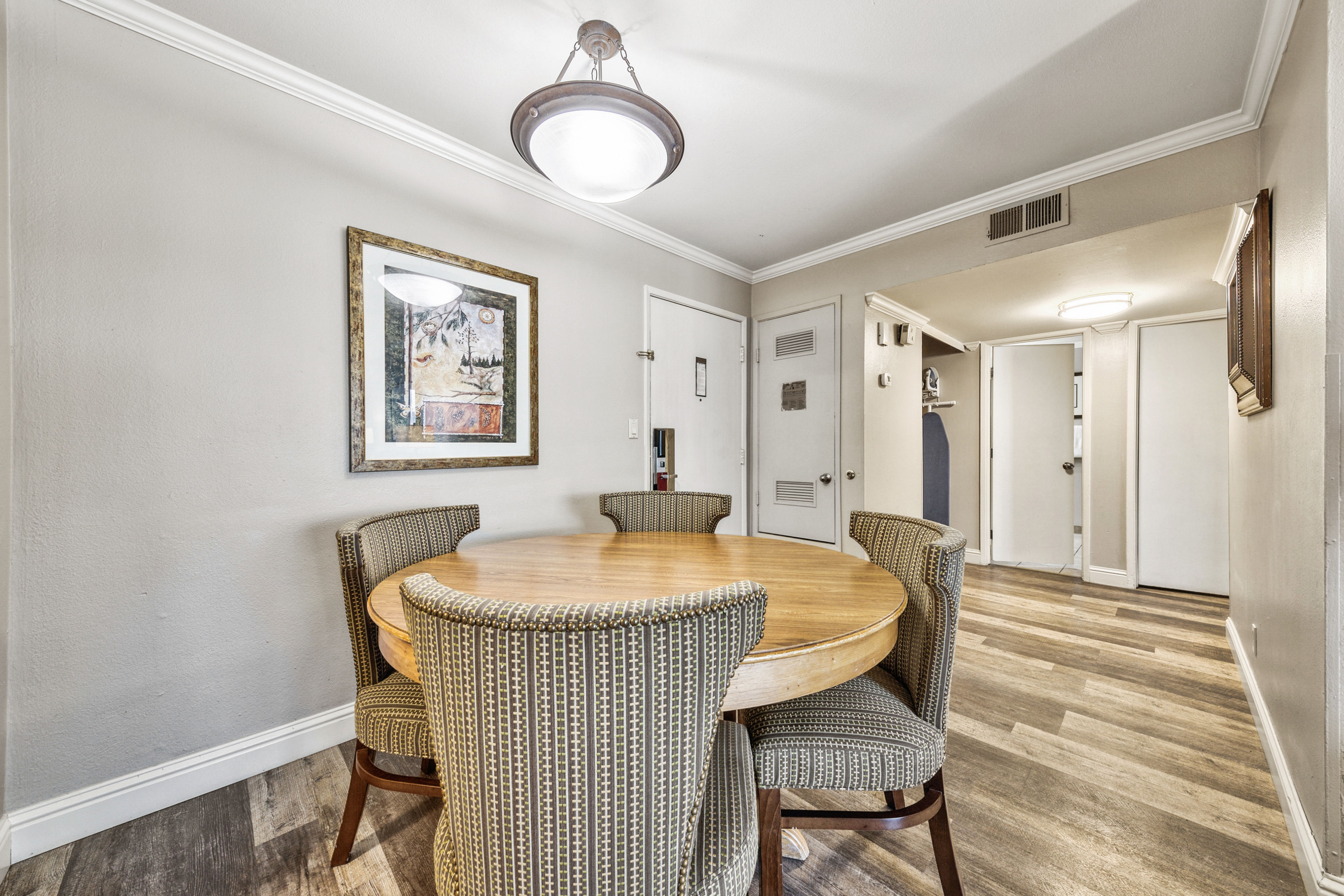 image A charming dining space with a cozy ambiance, seamlessly connecting to the rest of the home for a warm and welcoming feel.