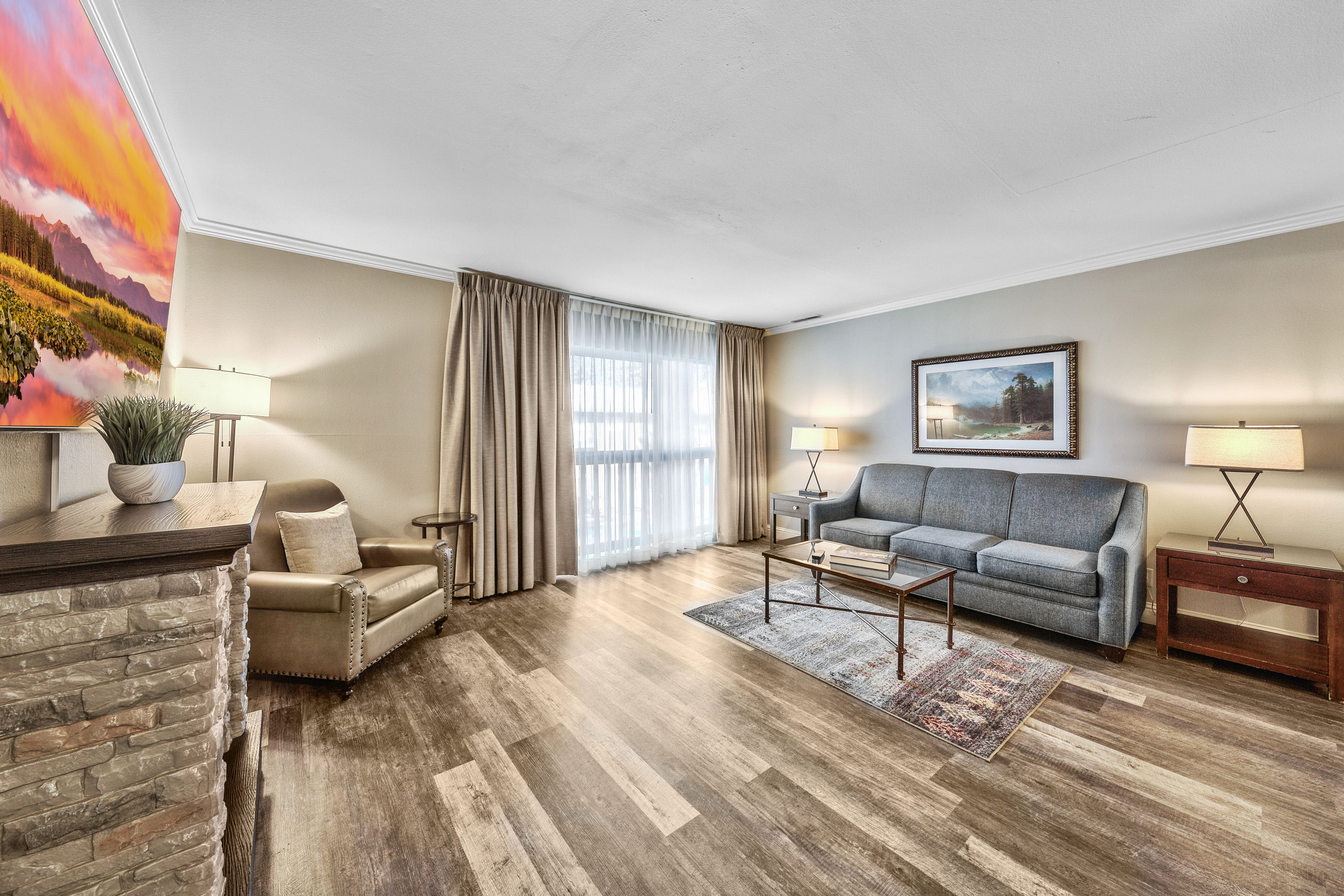 image A warm and inviting living space with stylish decor, soft lighting, and a cozy ambiance—perfect for relaxation after a day of adventure.