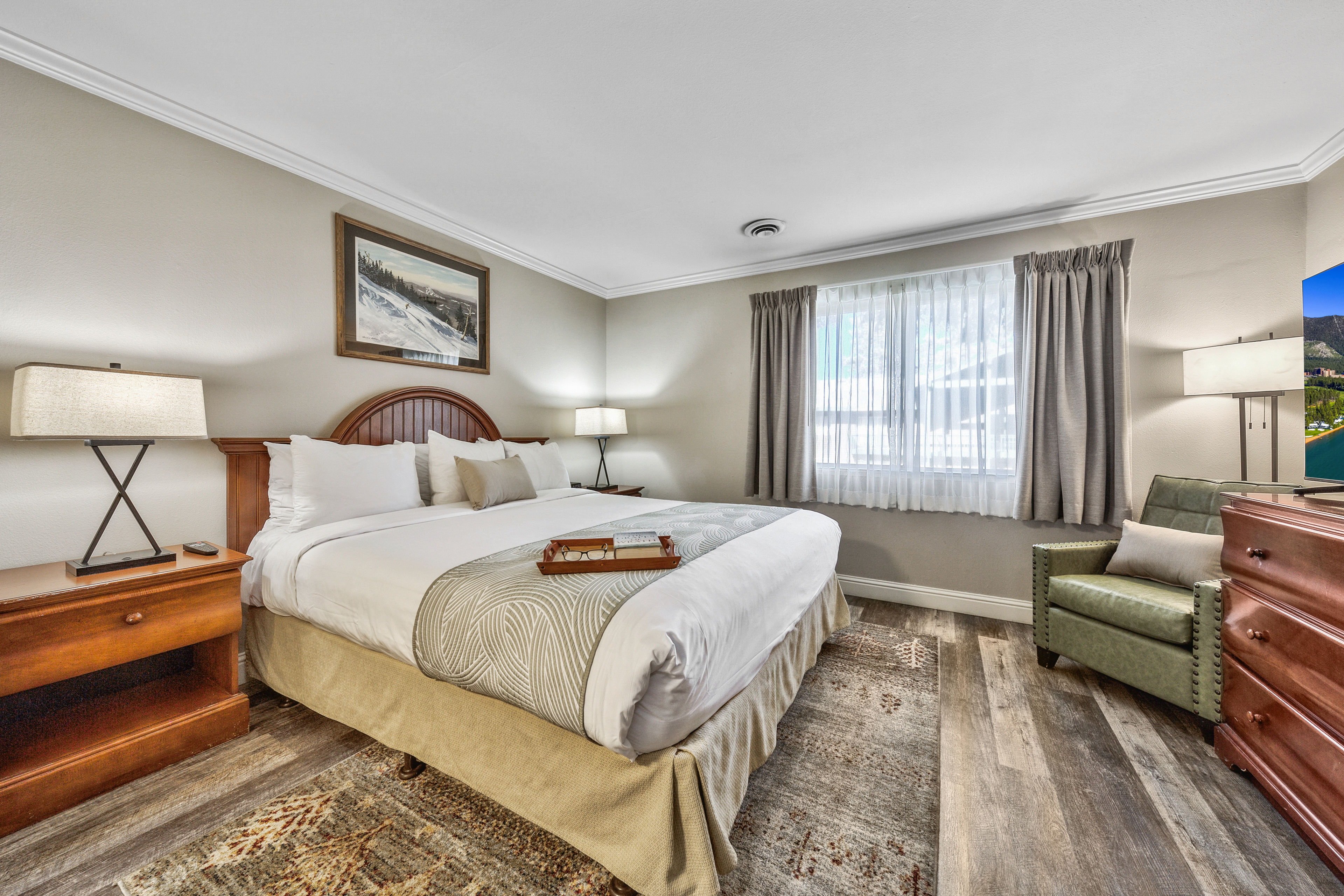 image A peaceful retreat with soft bedding, warm lighting, and a spacious layout designed for ultimate comfort and relaxation.