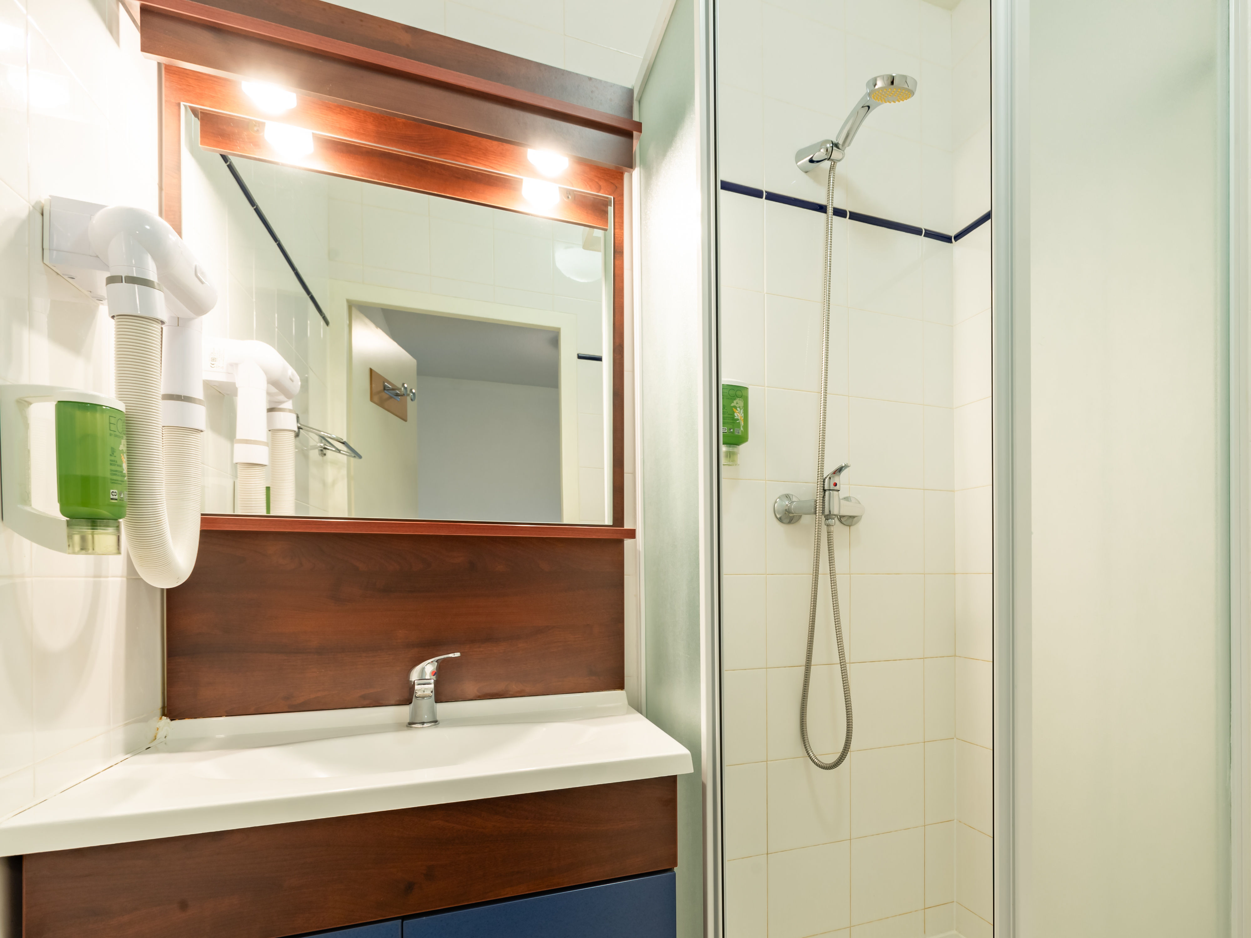 image Rinse off after a day on the pistes in the glass-door shower, with a hair dryer on the wall.