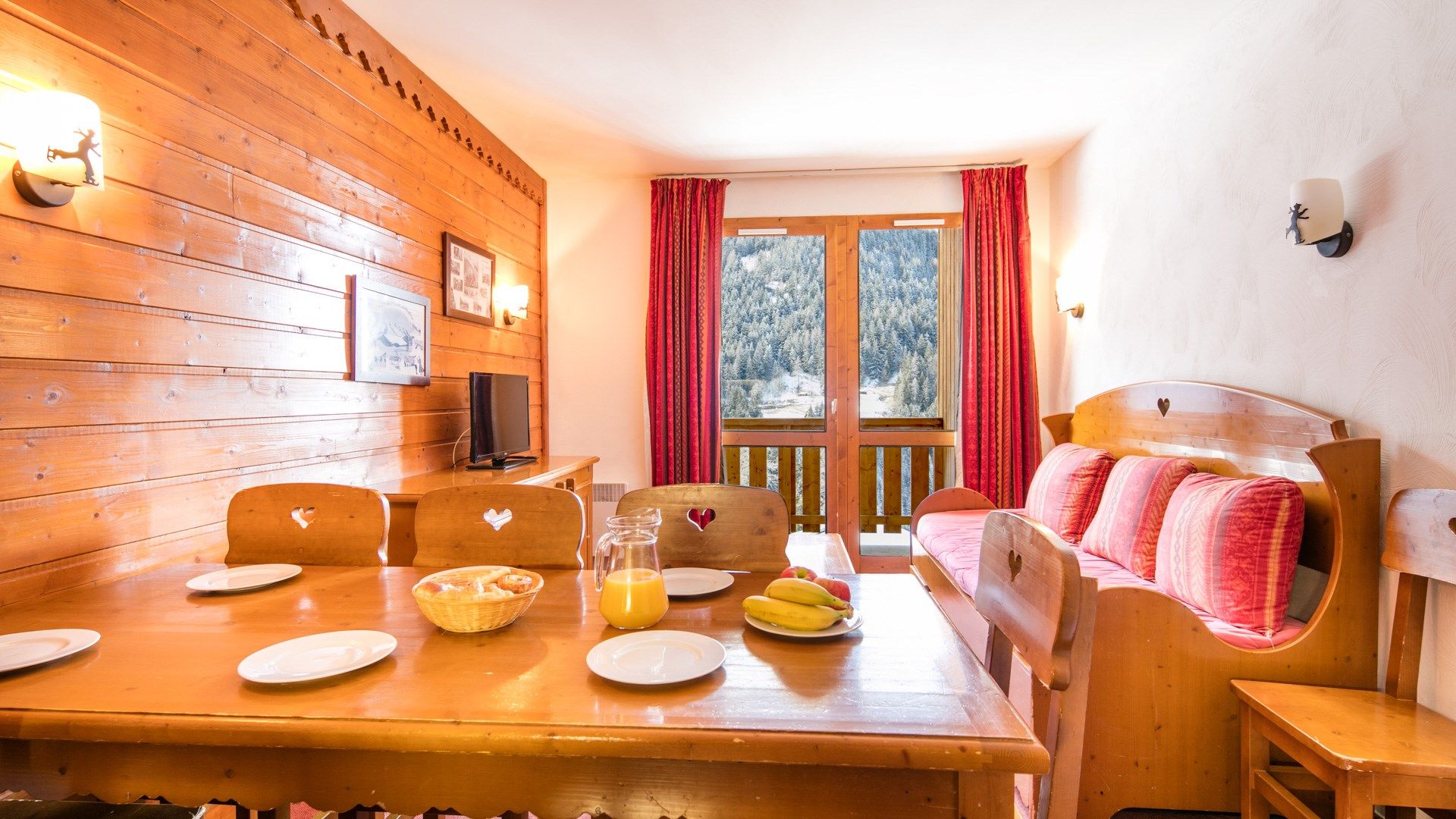 image Warm up in the cozy living space with your loved ones after an exciting day on the slopes