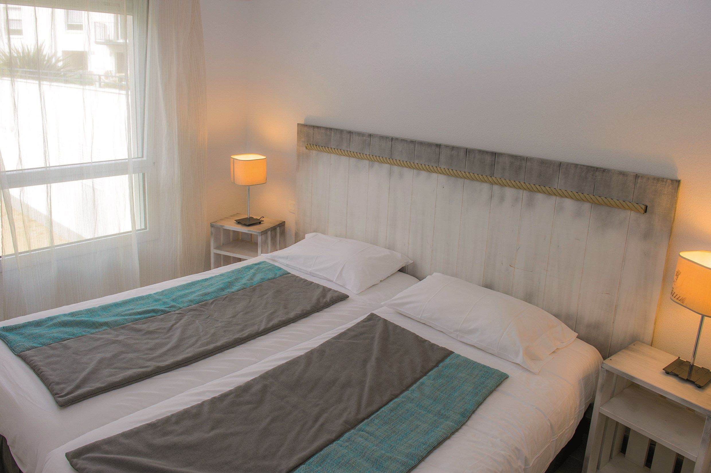 image The second bedroom contains 2 Single beds.