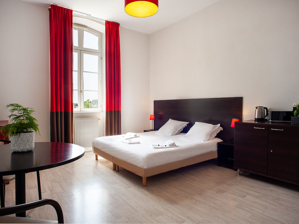 image Drift to sleep in a comfortable bed after a wonderful day outside.