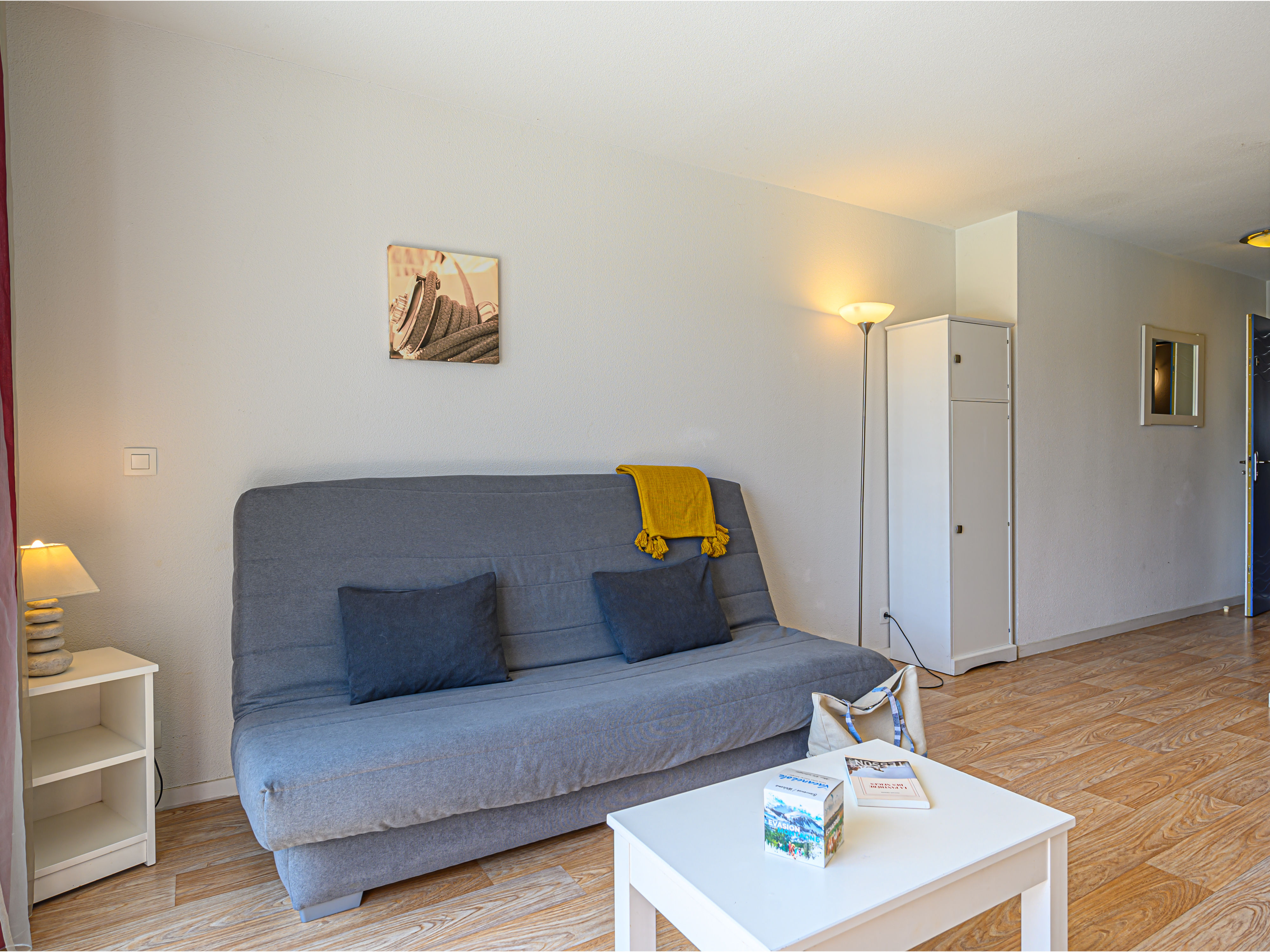 image Kick back your feet and relax in the cozy living area.